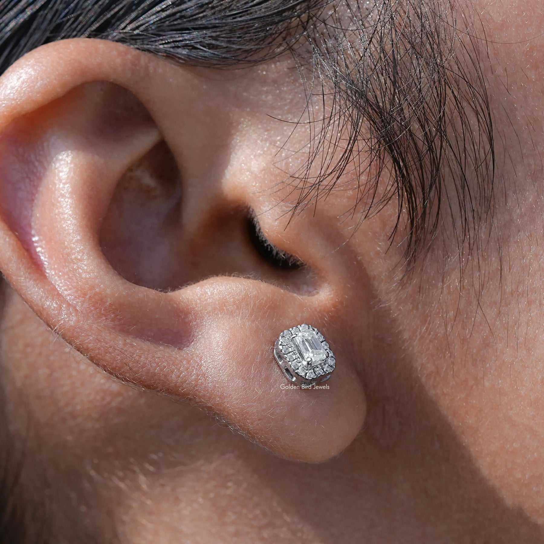 Side view of moissanite earrings crafted in white gold