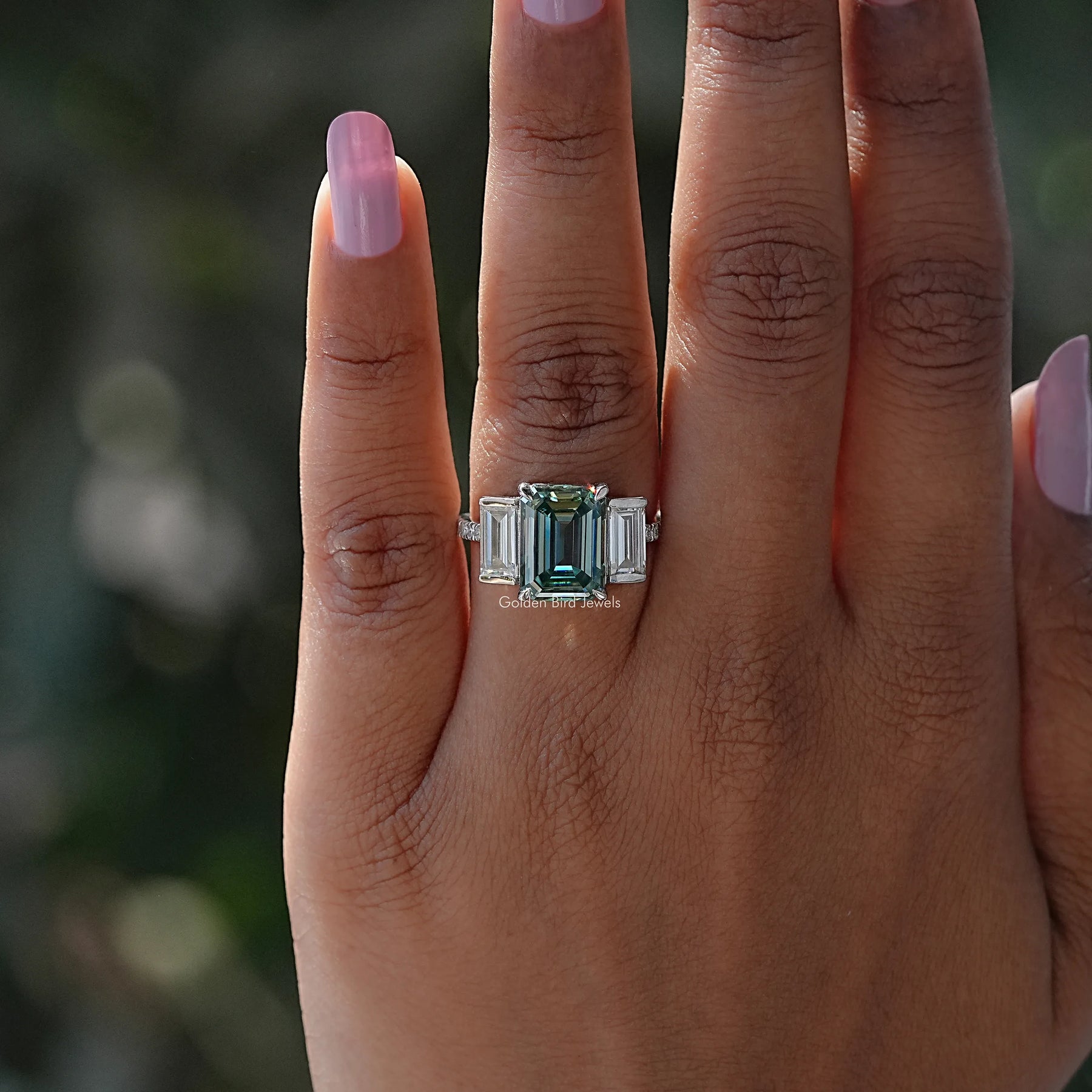 Detailed View Of Blue Green Emerald Cut 3 Stone Ring