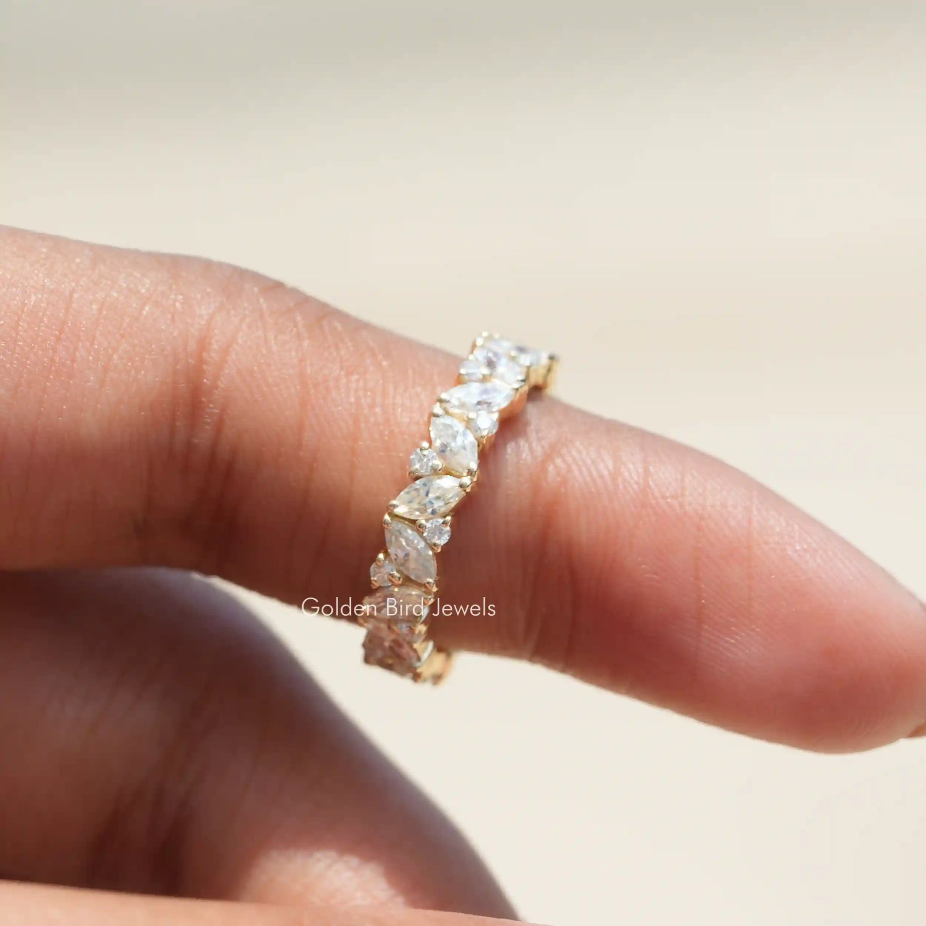 View of solitaire Moissanite Full Eternity Band in prongs setting