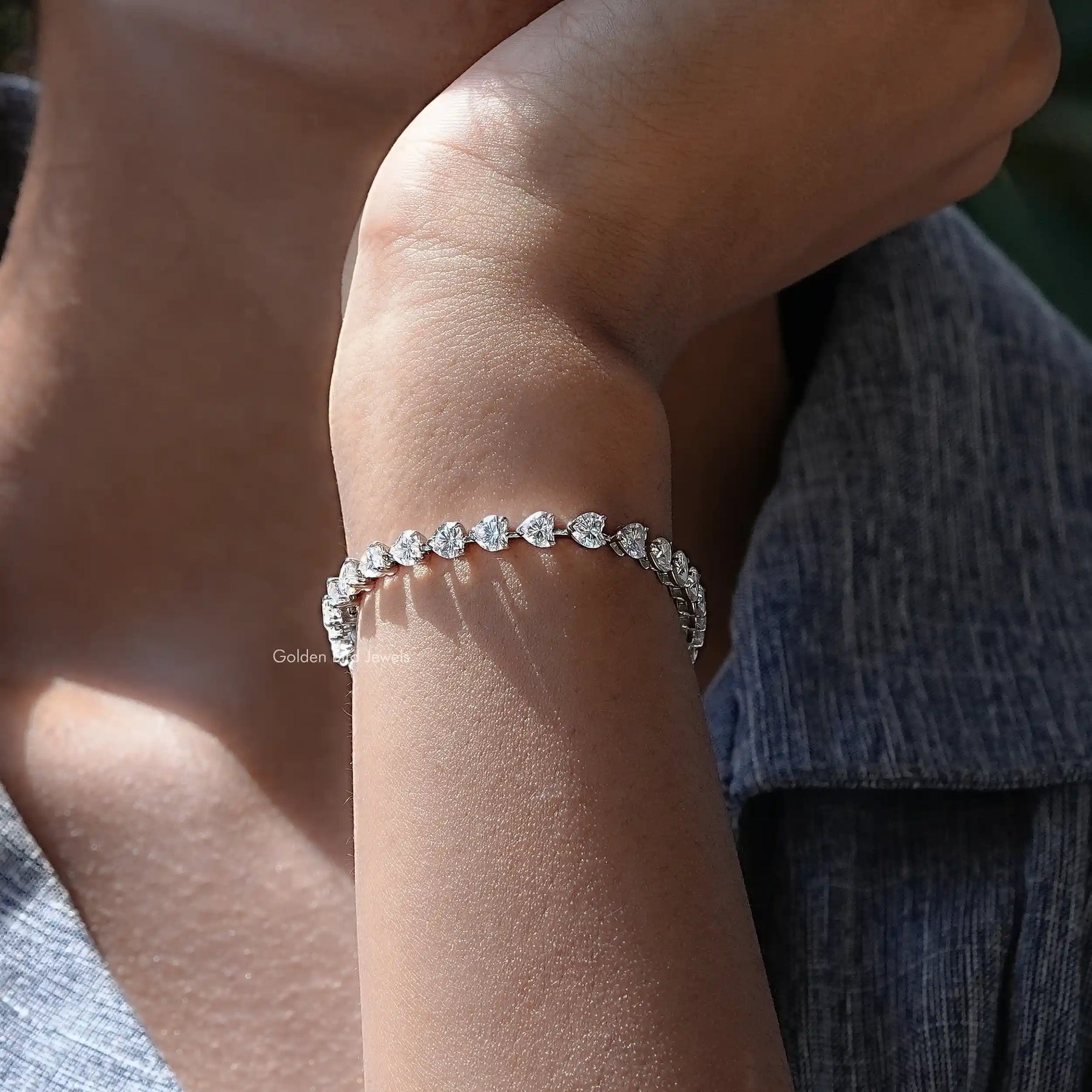 Side view of moissanite heart Cut Bracelet In white Gold