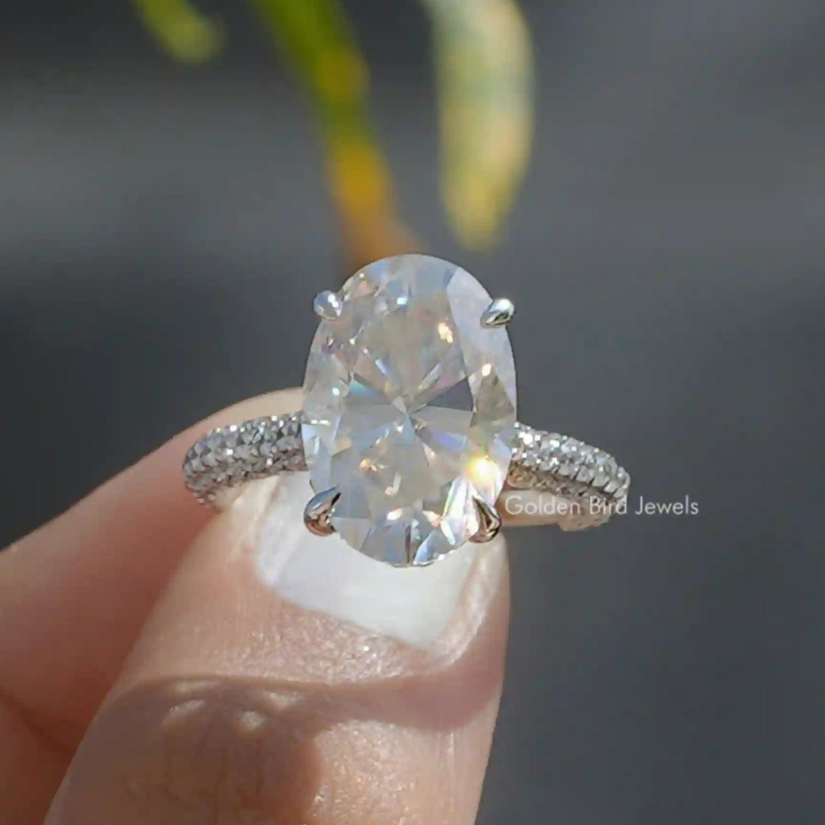 Front View of Colorless Moissanite Stone Engagement Ring In Finger