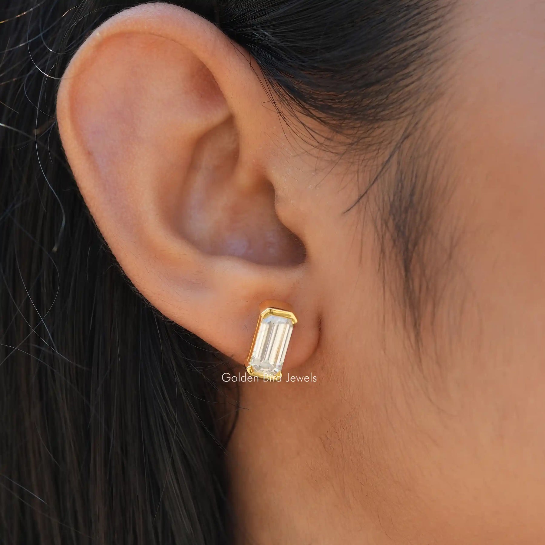 Emerald cut moissanite earrings crafted in unique design