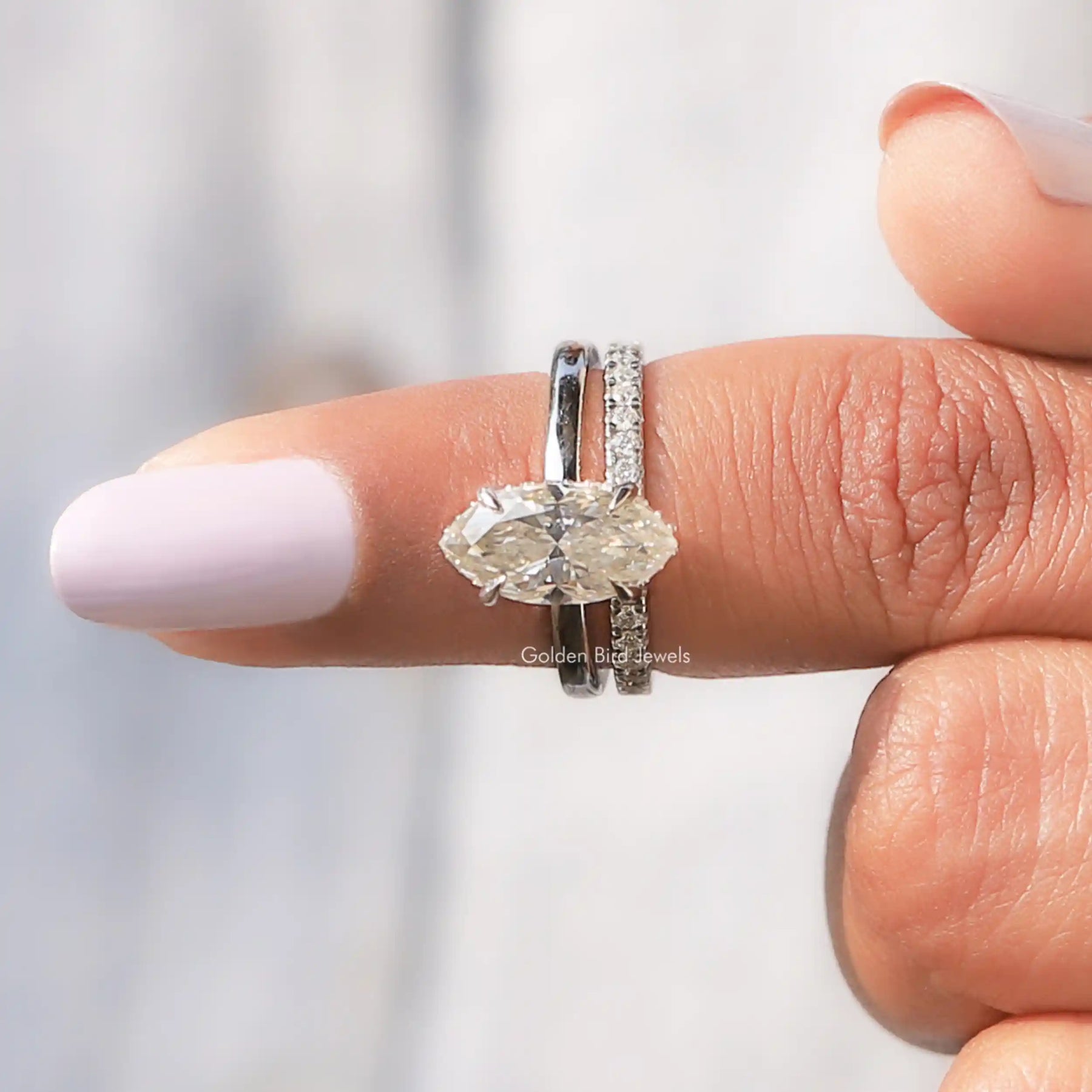 In finger front view of Moissanite Marquise Cut Halo Bridal Wedding Ring In white gold