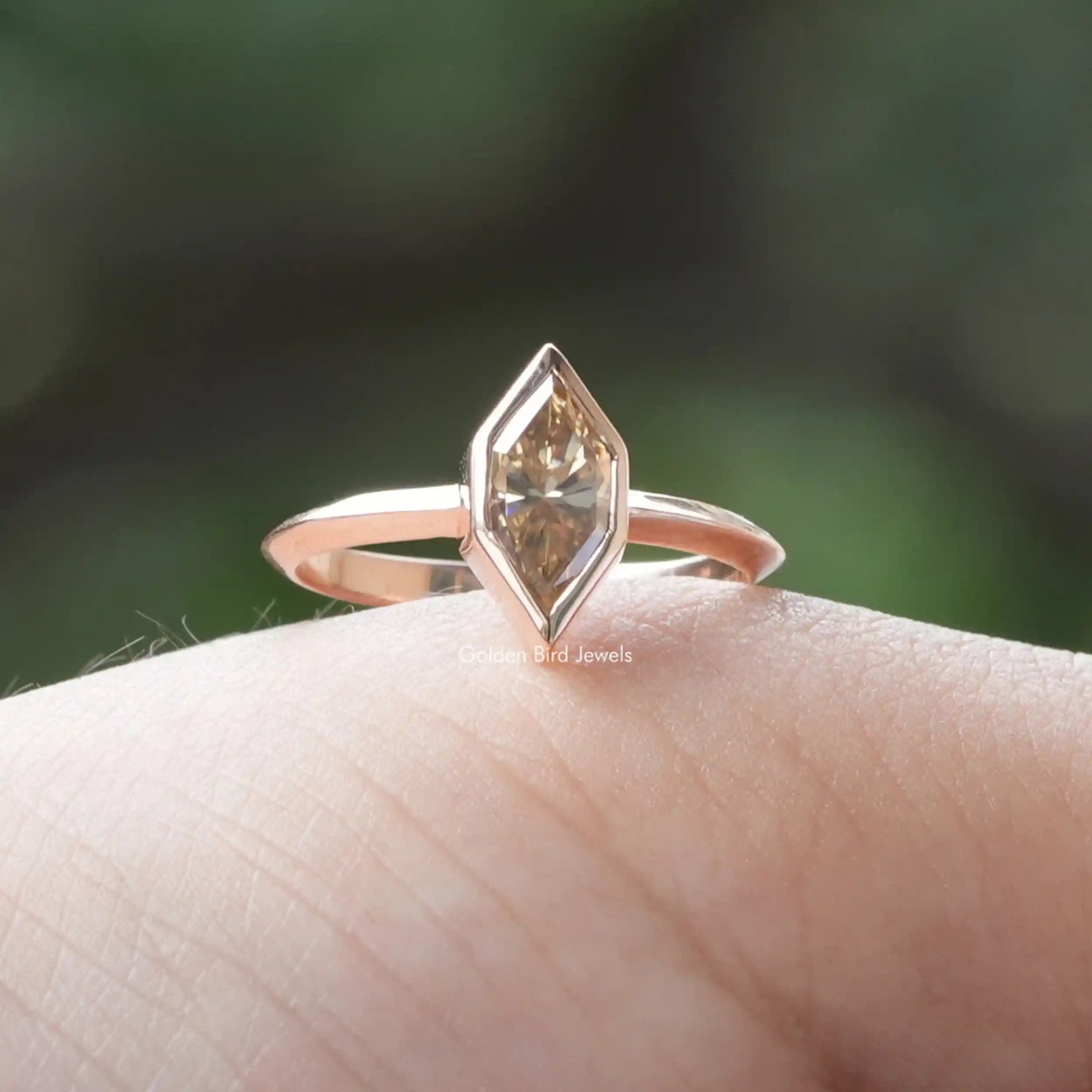 View Of Step Cut Dutch Marquise Cut Engagement Ring Made Of Bezel Set