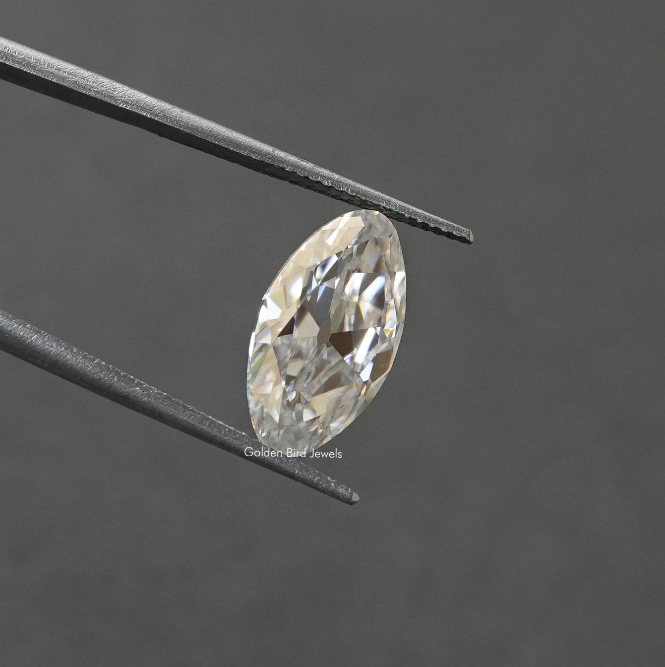 In Tweezer View Of Old Mine Moval Cut Loose Moissanite Stone