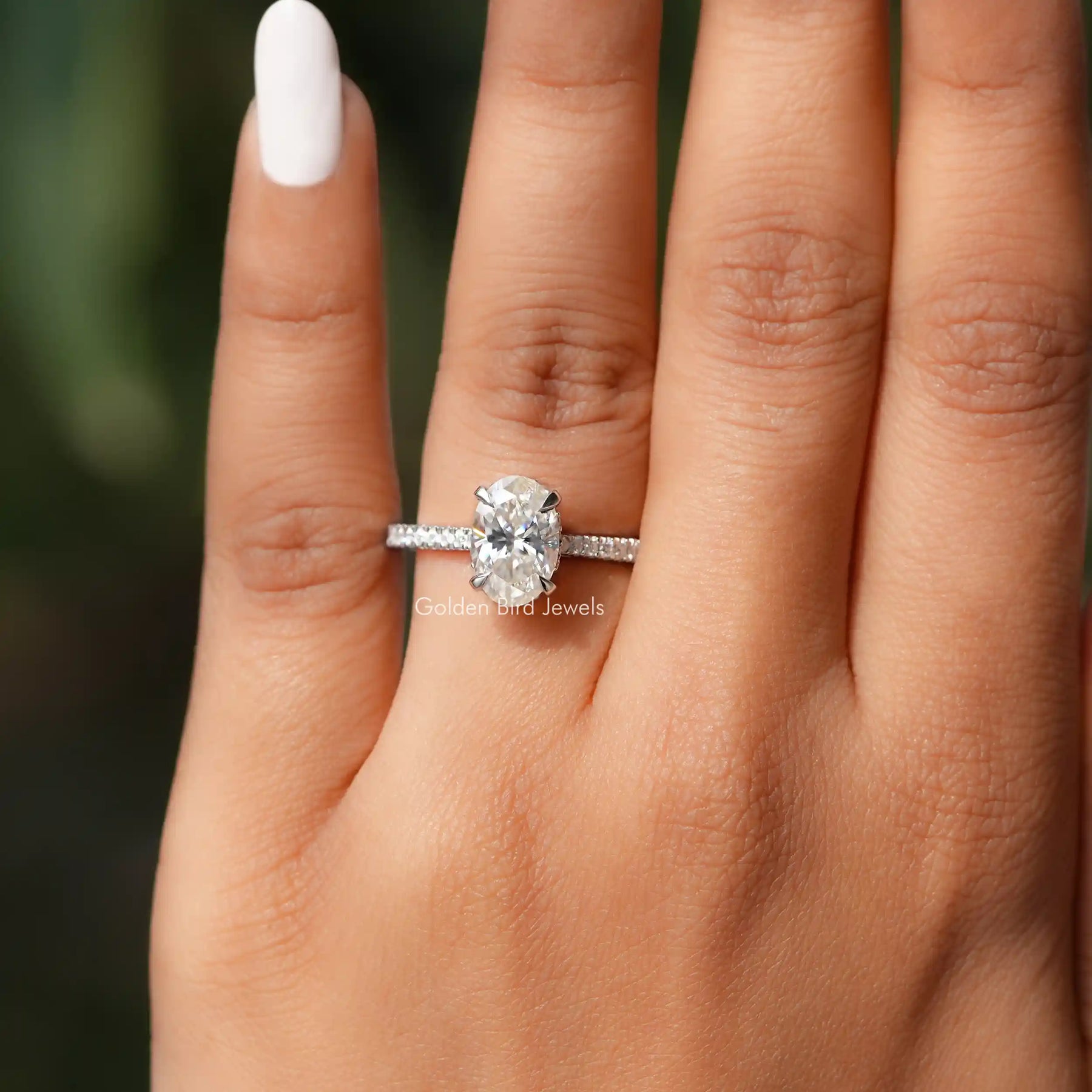 Close-Up View of Hidden Halo Oval Cut Moissanite Ring In White Gold