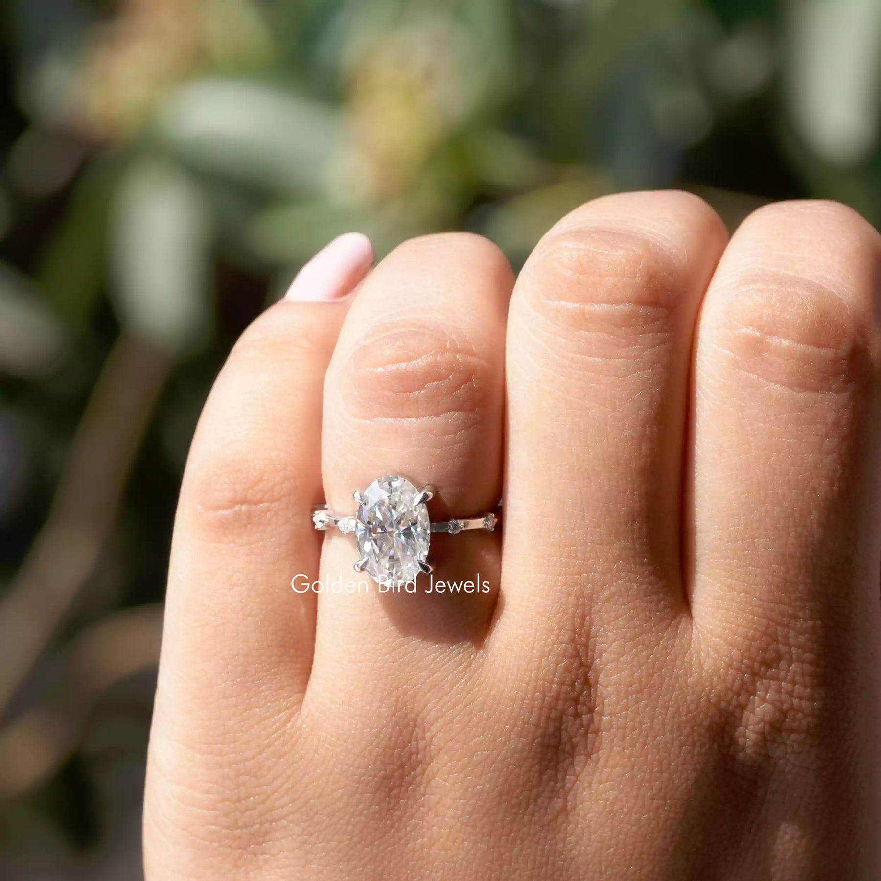 View of Moissanite Oval Cut Engagement Ring In White Gold