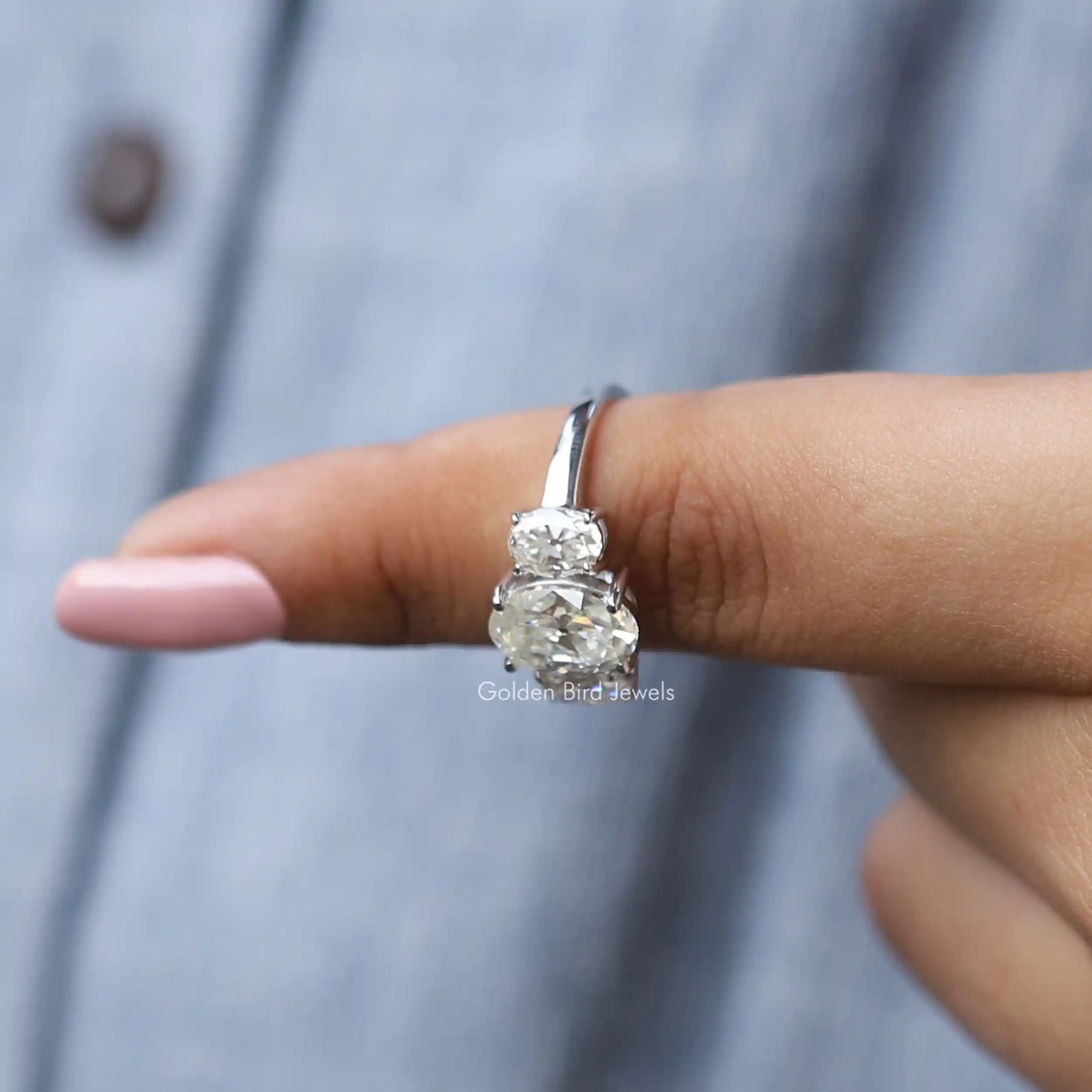 In finger front View of Colorless Oval Cut Moissanite Engagement Ring