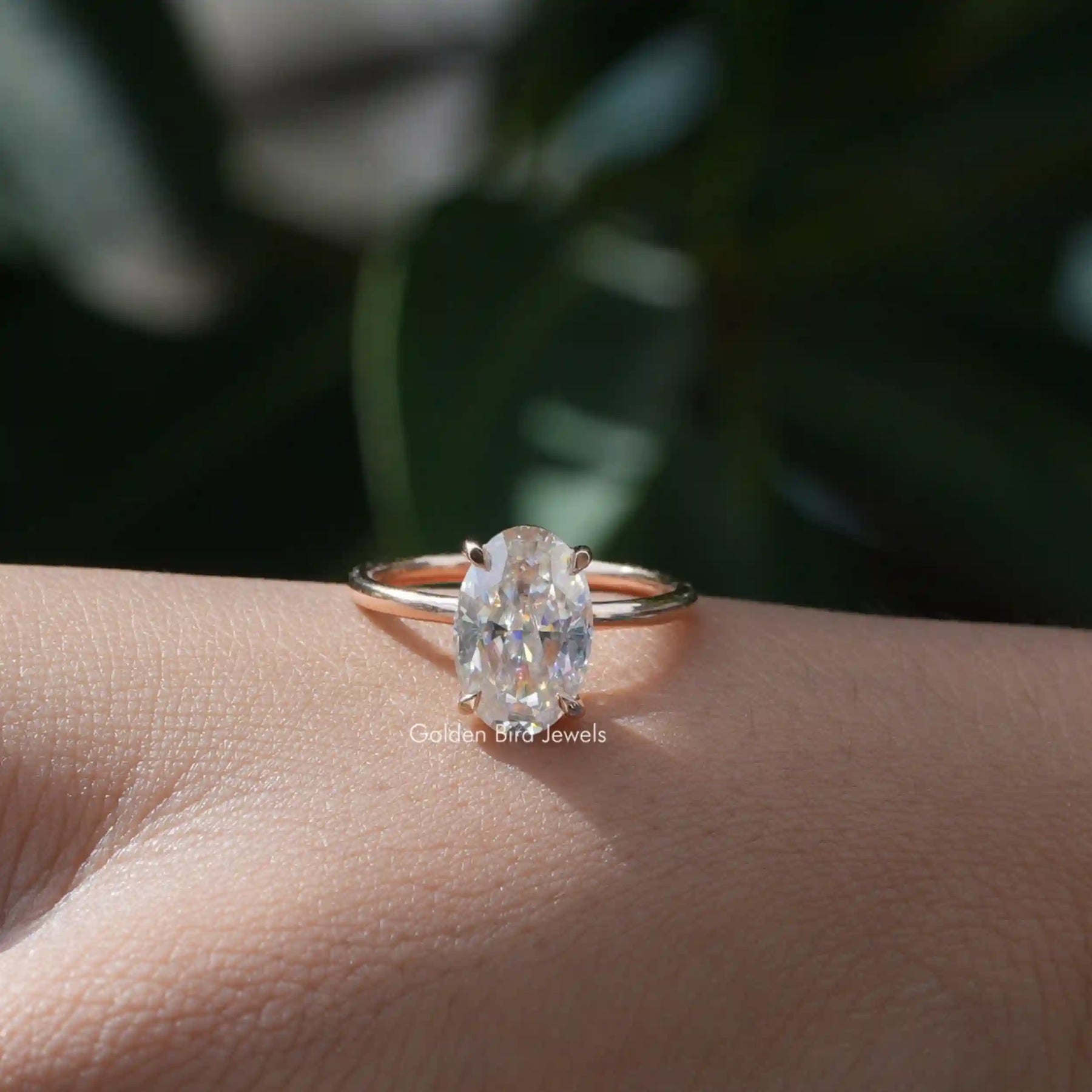Detailed View Of Oval Cut Moissanite Solitaire Ring In Yellow Gold