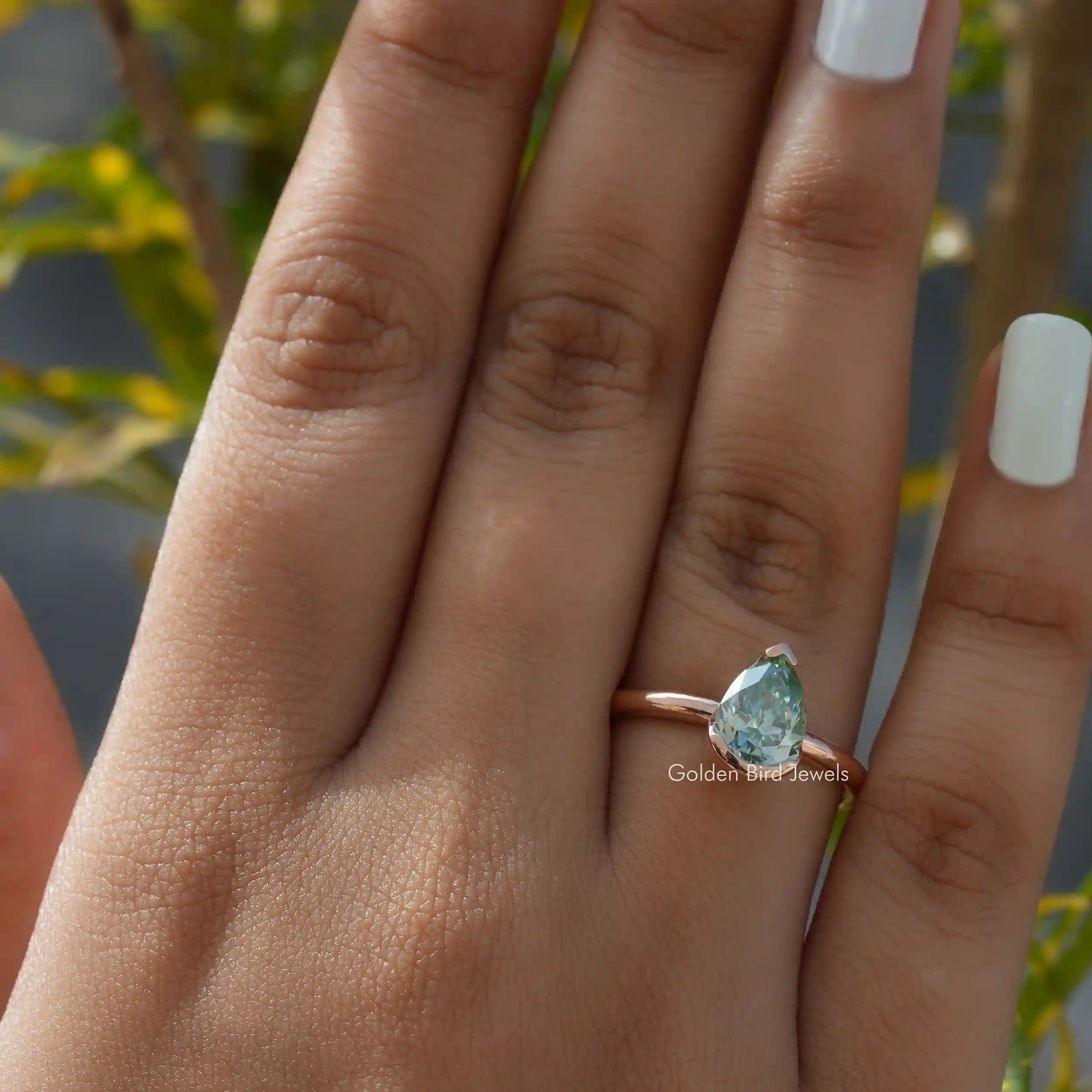 Green Pear Cut Moissanite Solitaire Ring In Yellow Gold