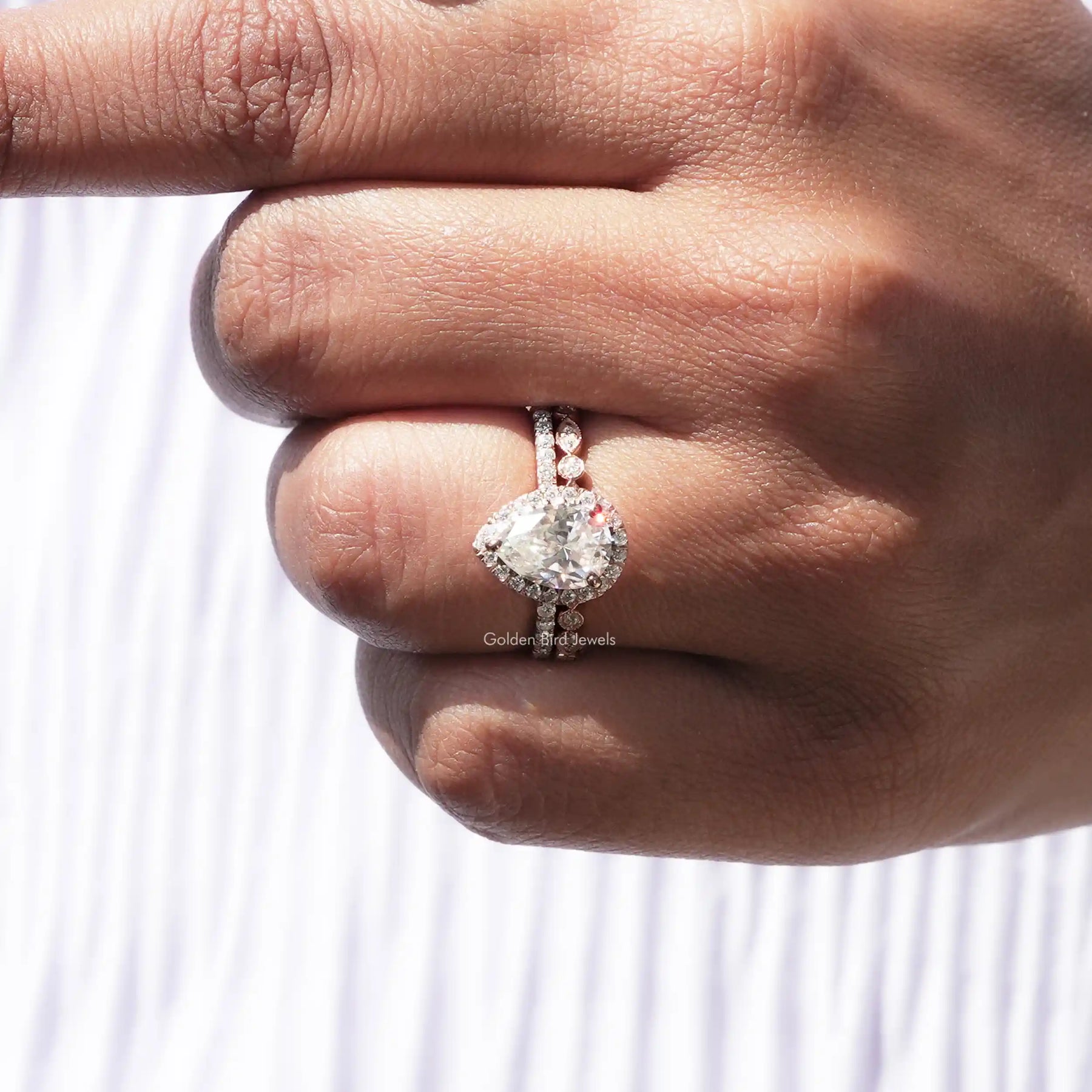 Pear Cut Moissanite Halo Bridal Ring In White Gold