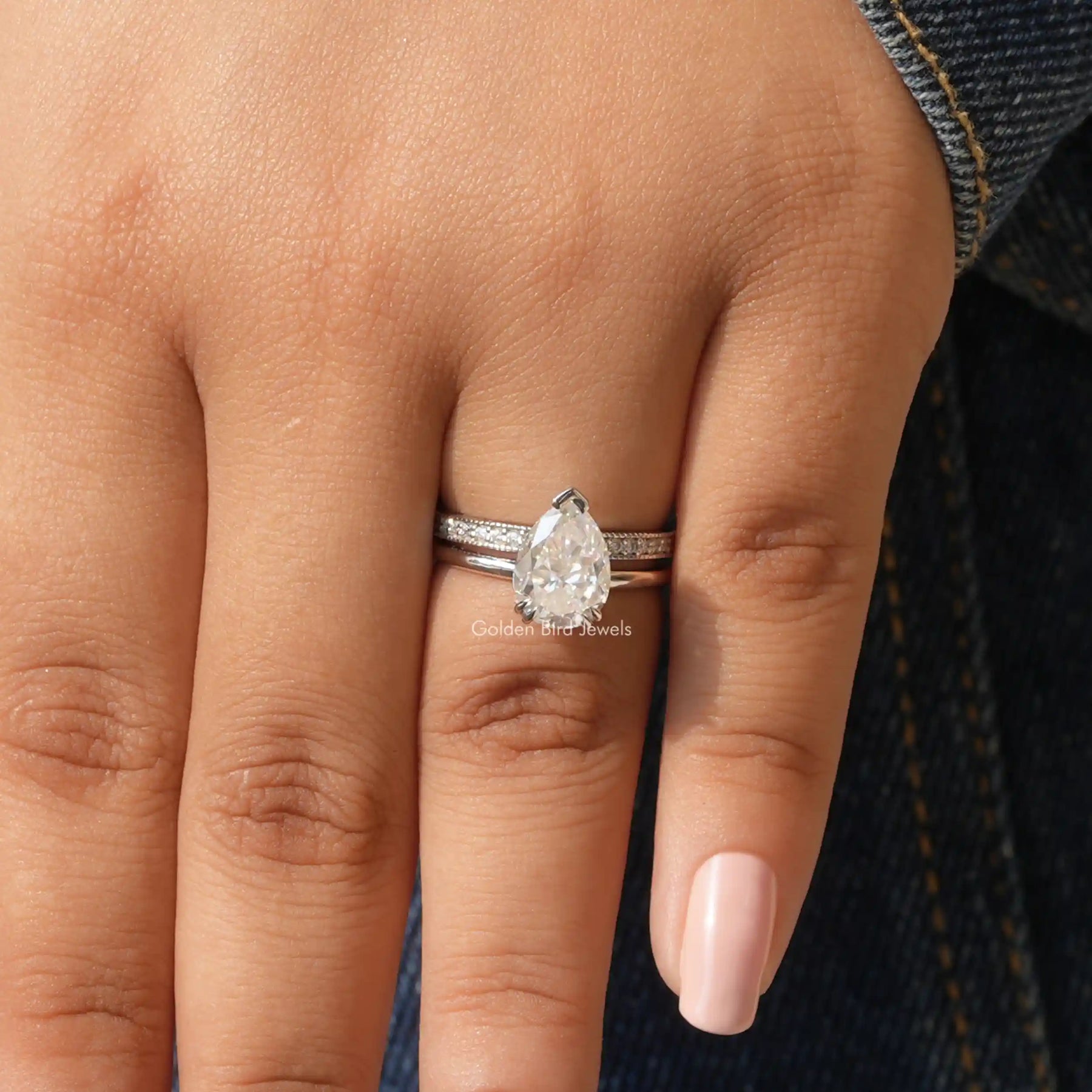 Pear Cut Hidden Halo Ring In finger