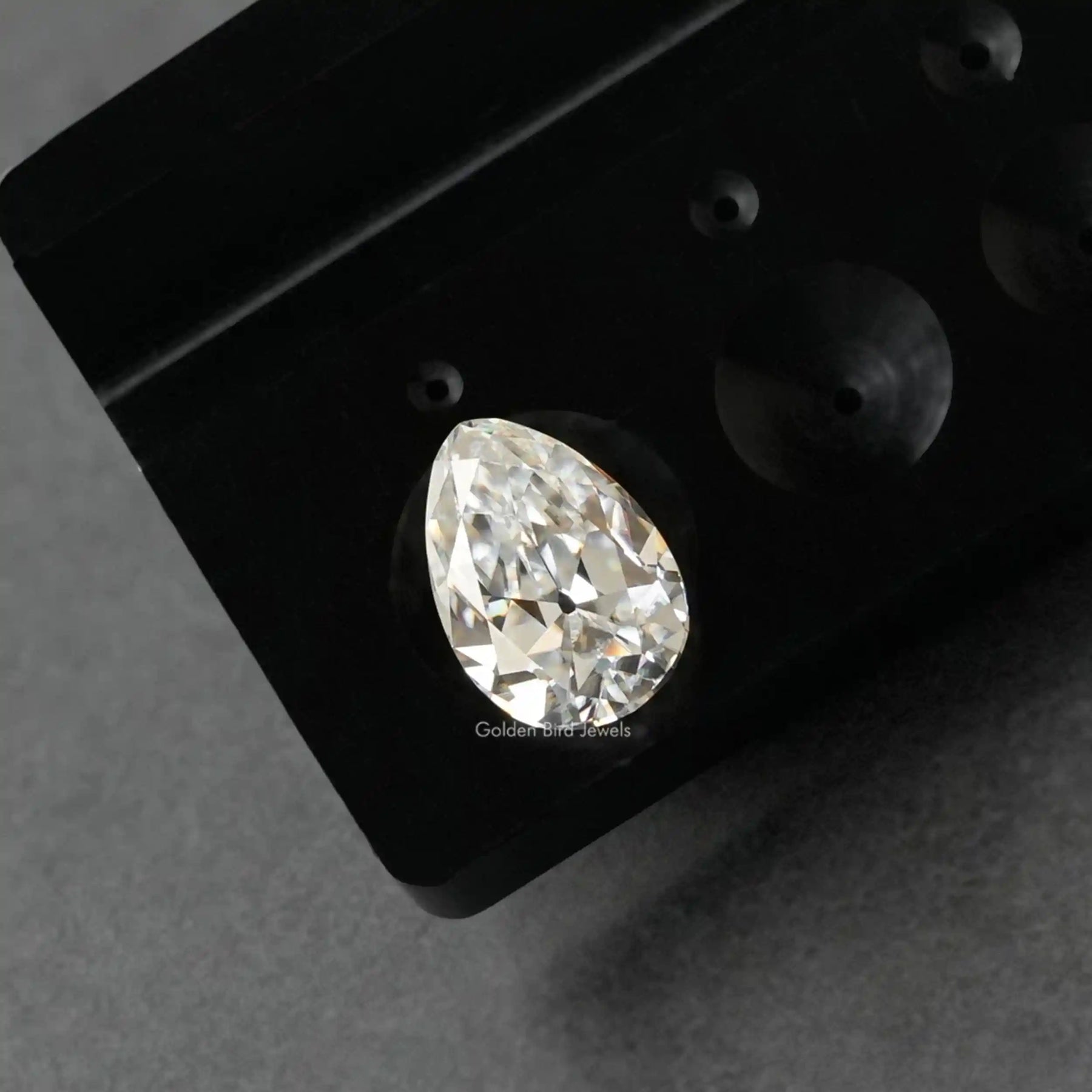 Close view of Moissanite Old Mine Pear Cut Loose Stone