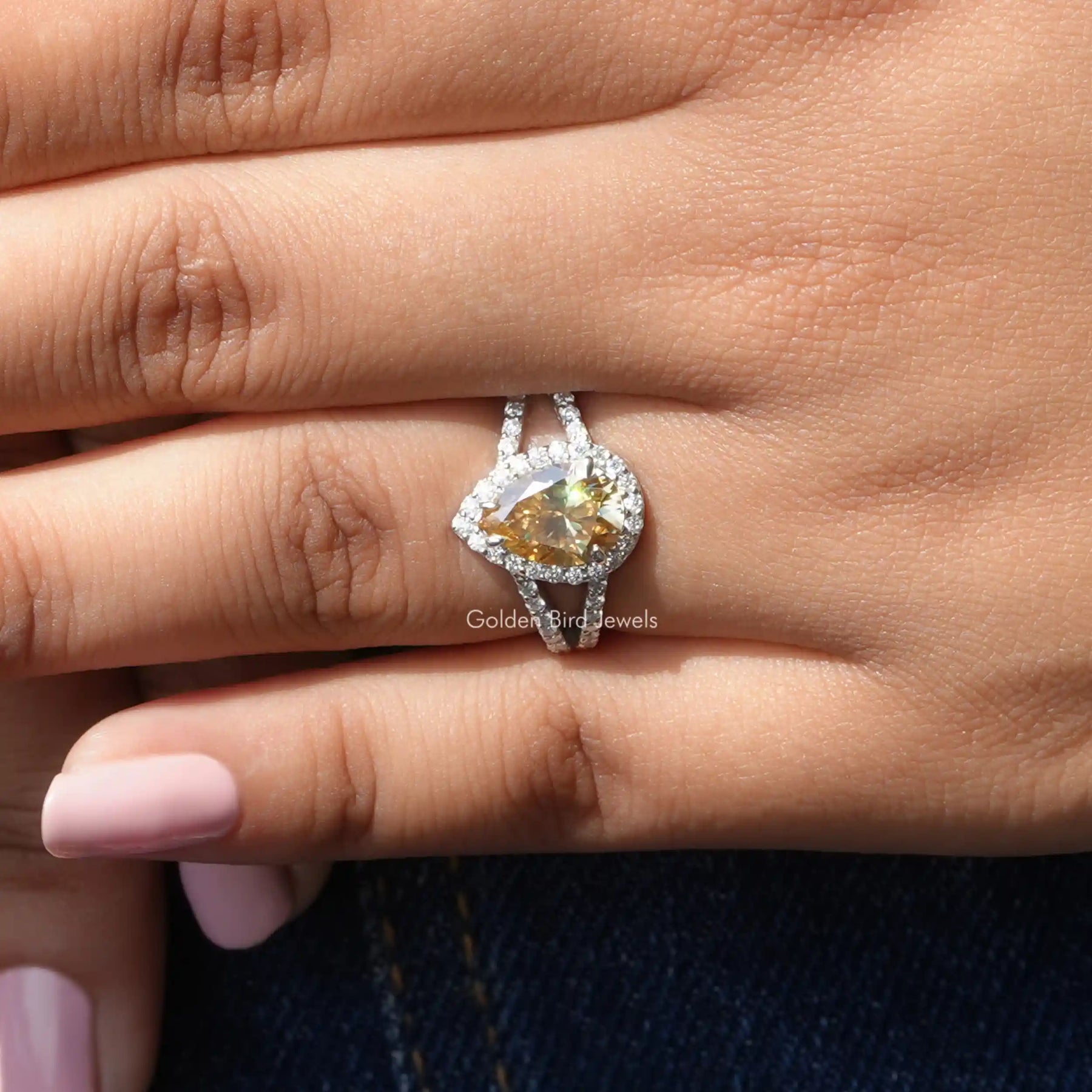 View of Moissanite Pear Cut Halo Engagement Ring In White Gold