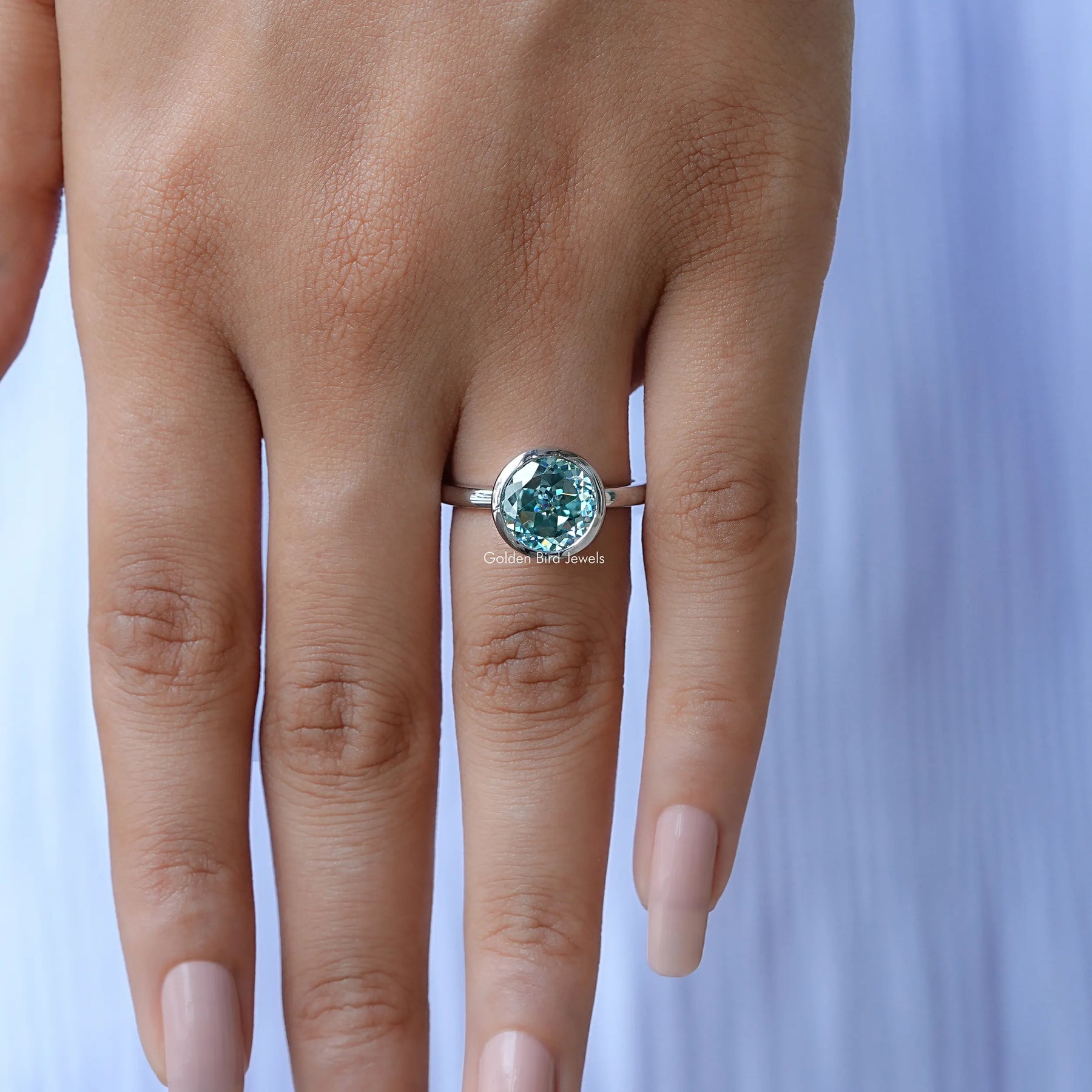 Front View of Portuguese Cut Moissanite Solitaire Ring In White Gold