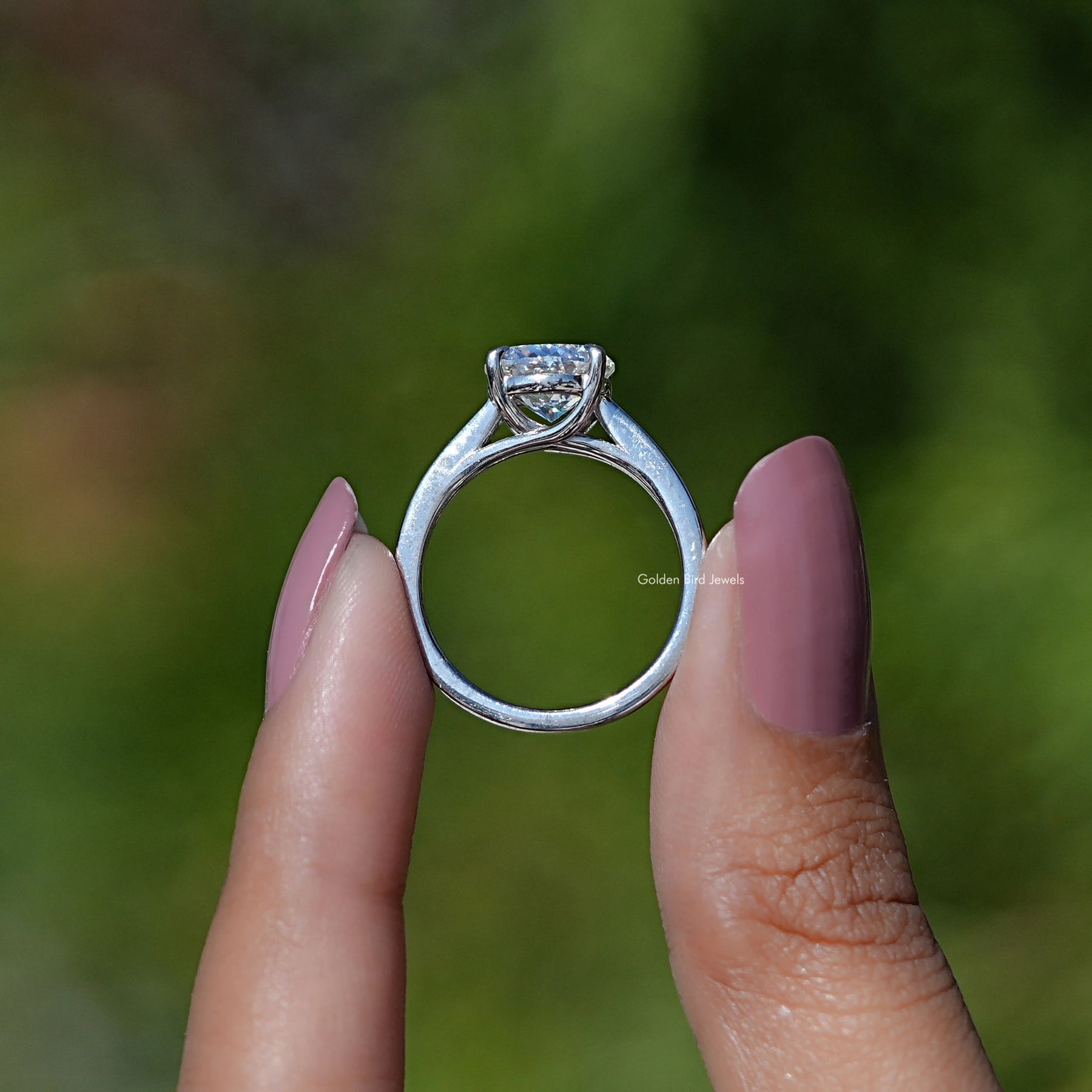 Back view of Portuguese Cut Moissanite Solitaire Ring in secure setting