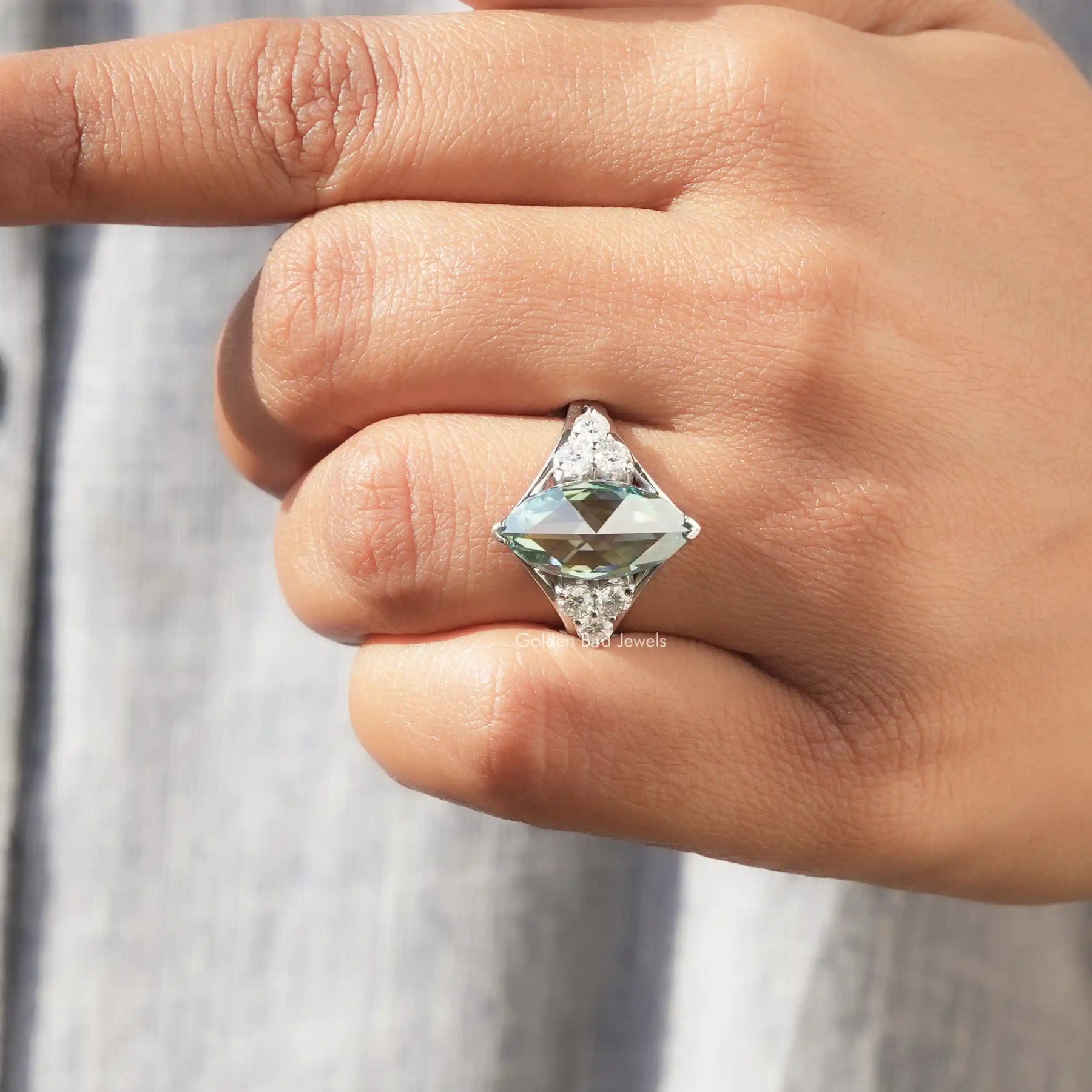 Close View of Rose Cut Marquise Moissanite Engagement Ring in a fingere