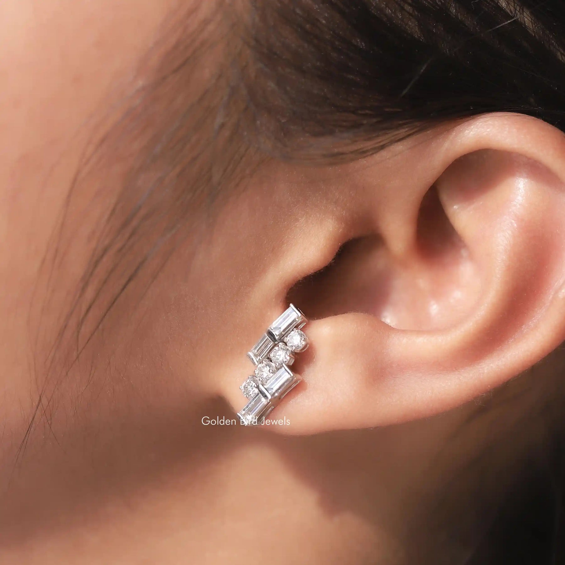 Detailed view of moissanite earrings in secure setting