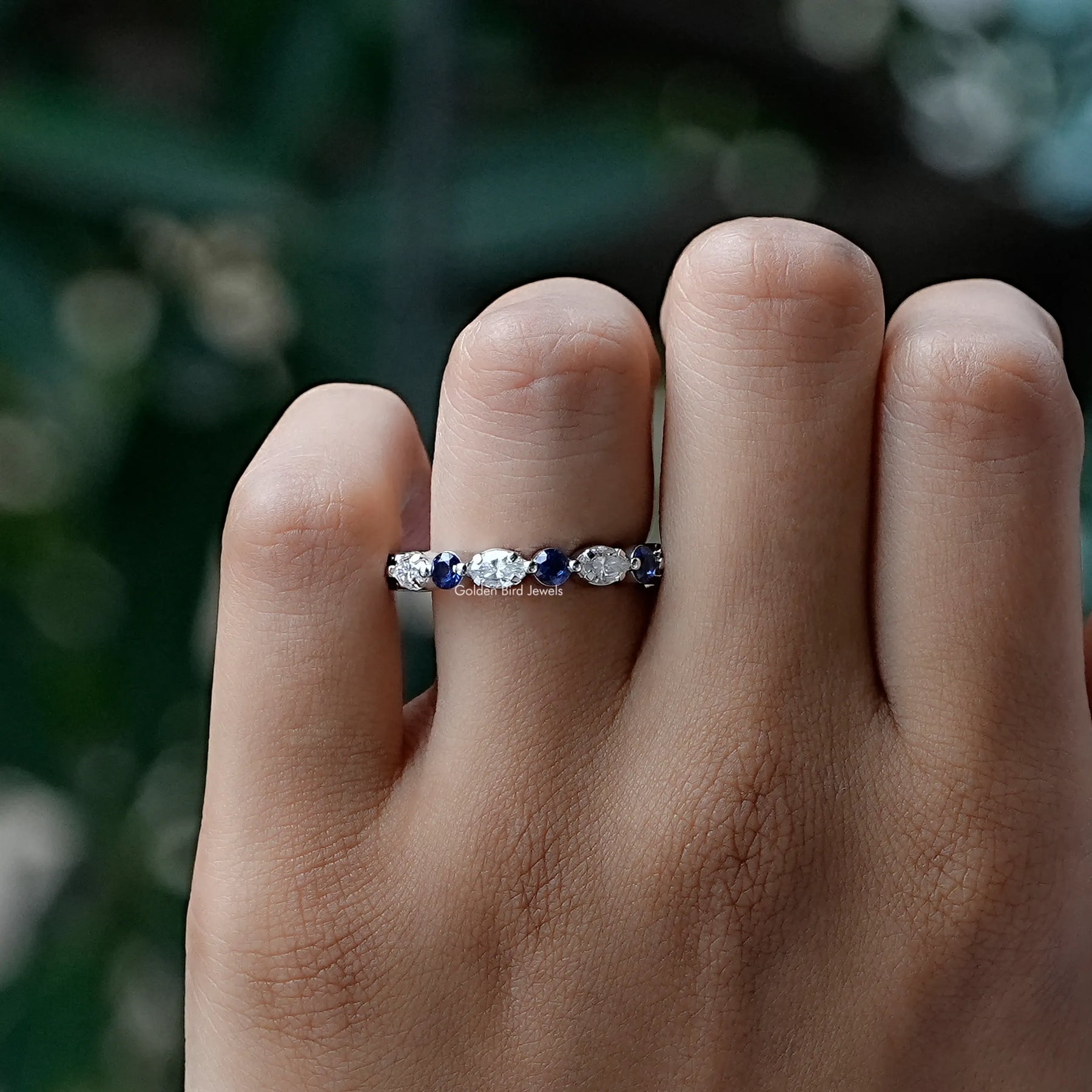 Detailed View of Round And Marquise Cut Moissanite Wedding Band In White Gold