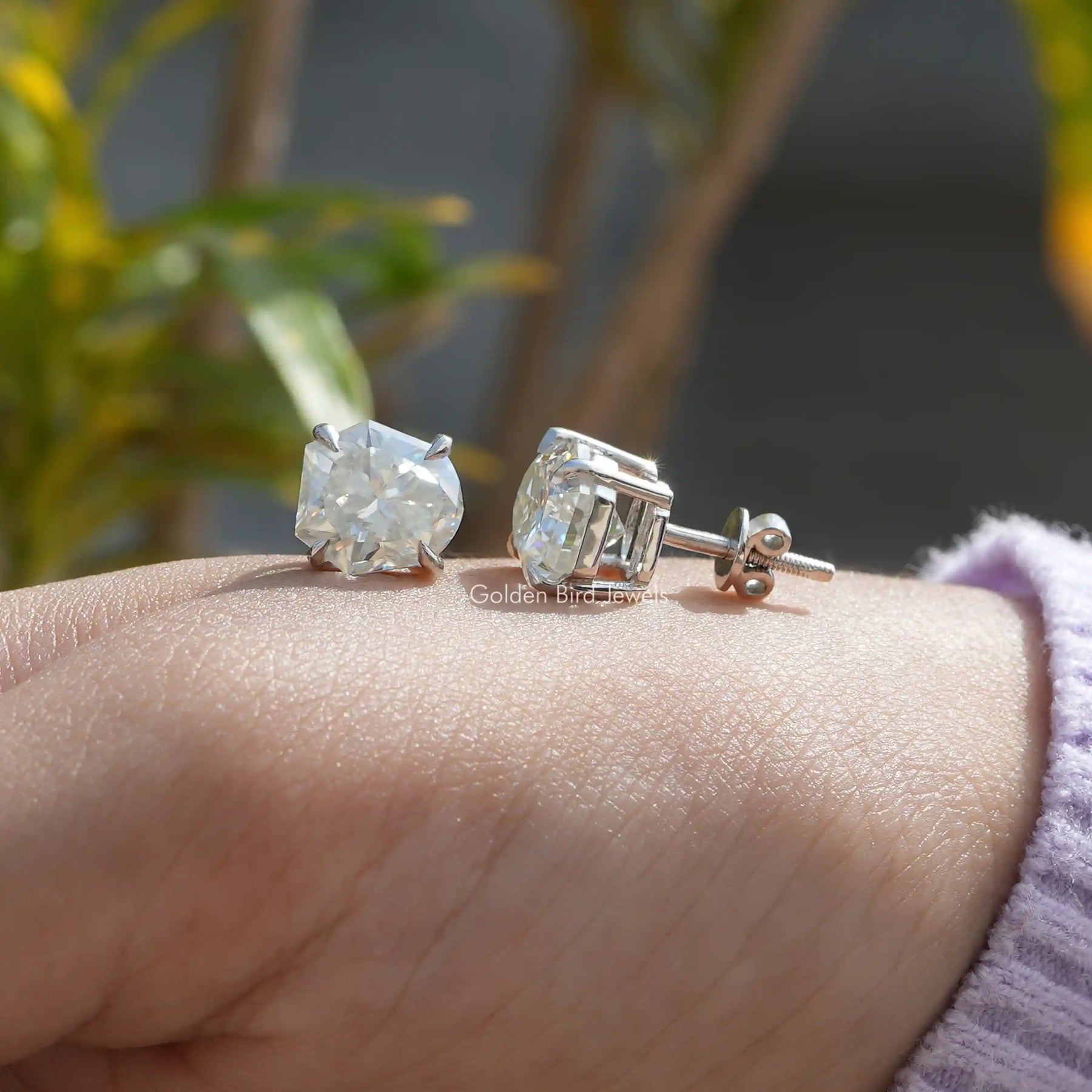 Front And Back Side View Of solitaire stud earrings crafted in moissanite stone