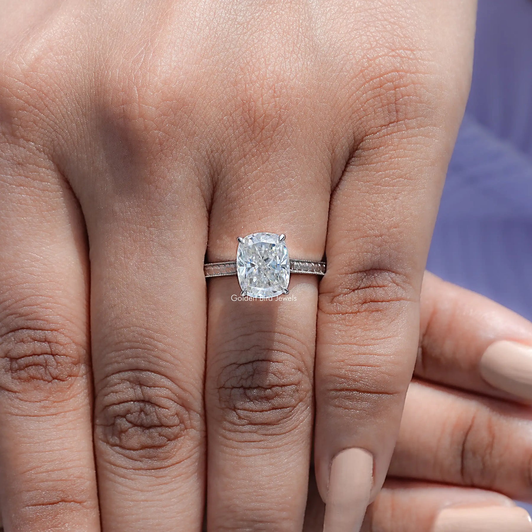 View of Elongated Cushion Cut Solitaire Ring in prongs setting