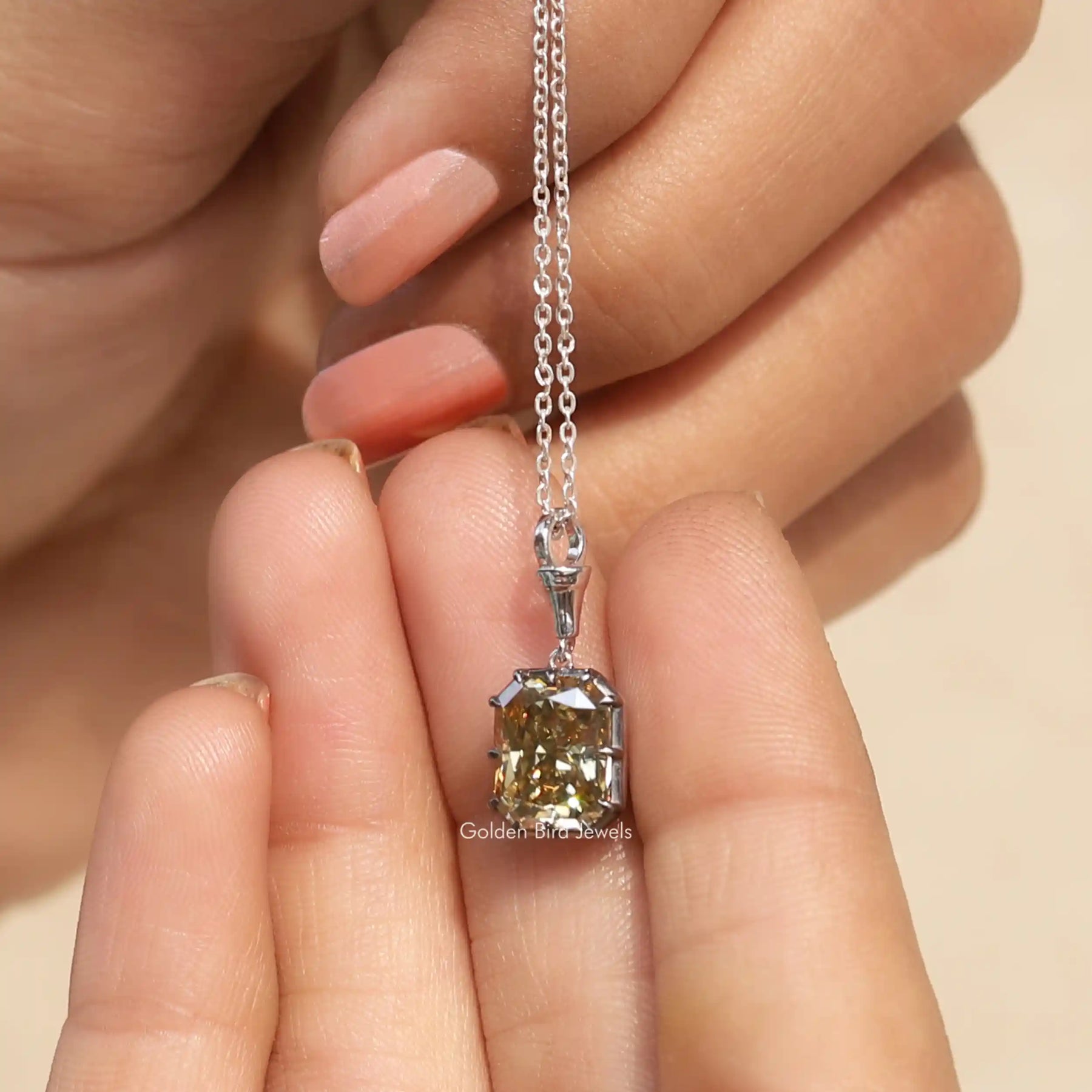 Detailed view of moissanite Radiant shape pendant