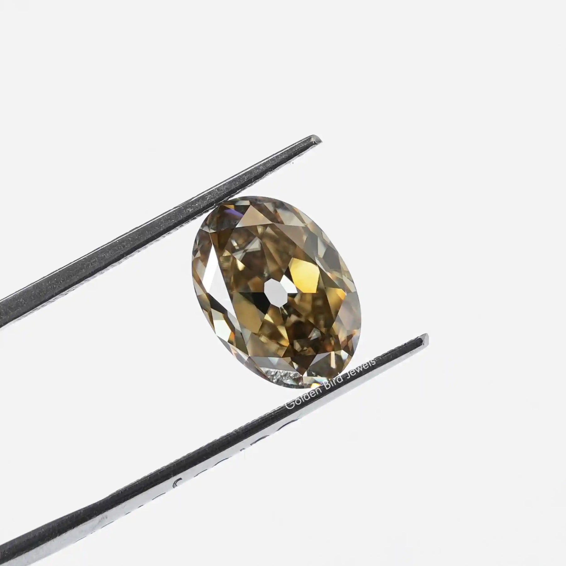 Tweezer view of Oval Cut Loose Moissanite Stone