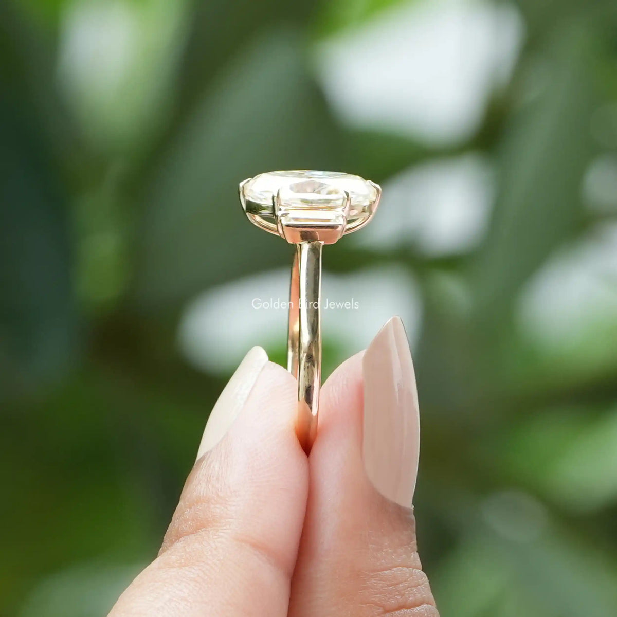 Side view of  halo moissanite engagement ring crafted in Prongs setting