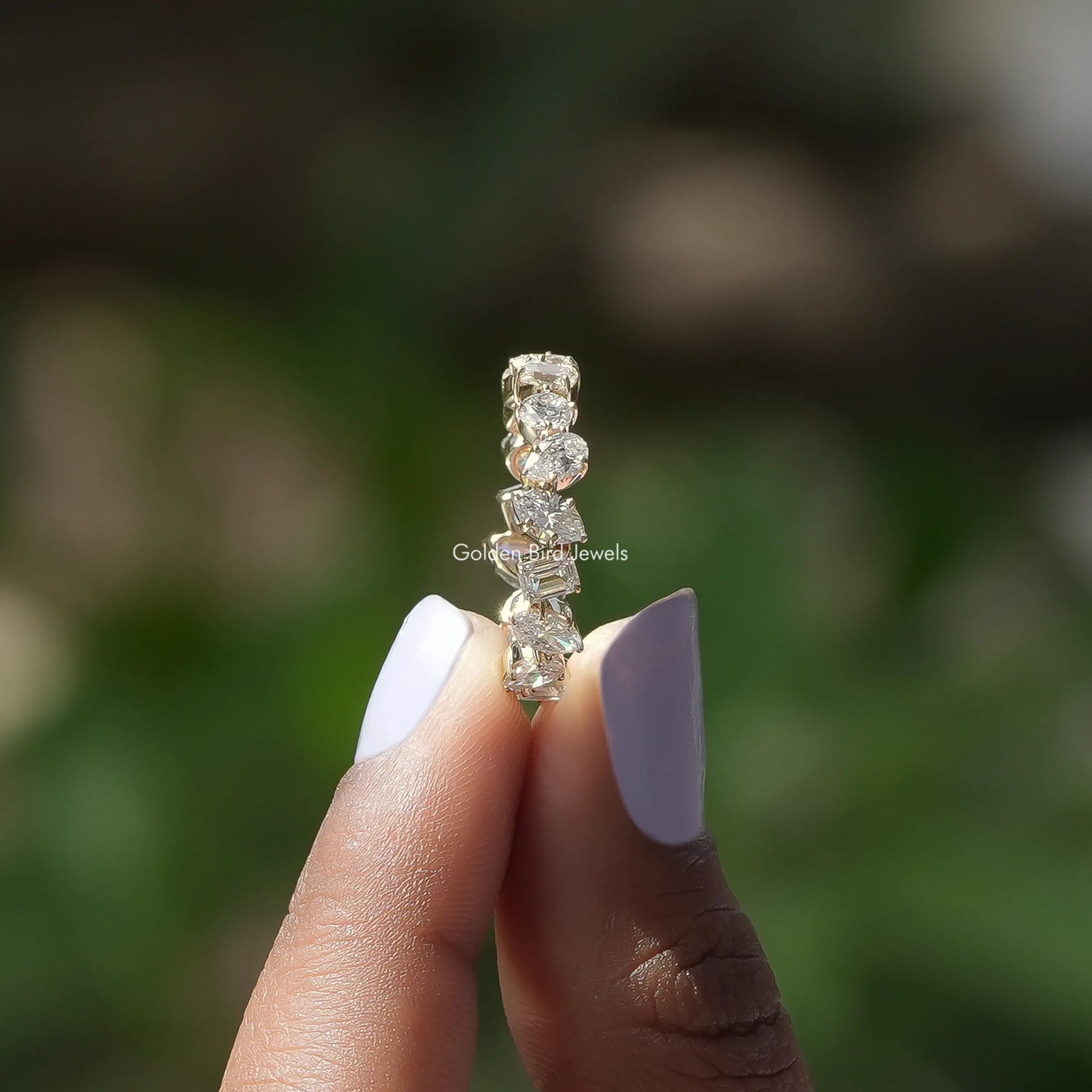 Side View of Multi Shape Lab Diamond Wedding Band In two fingers