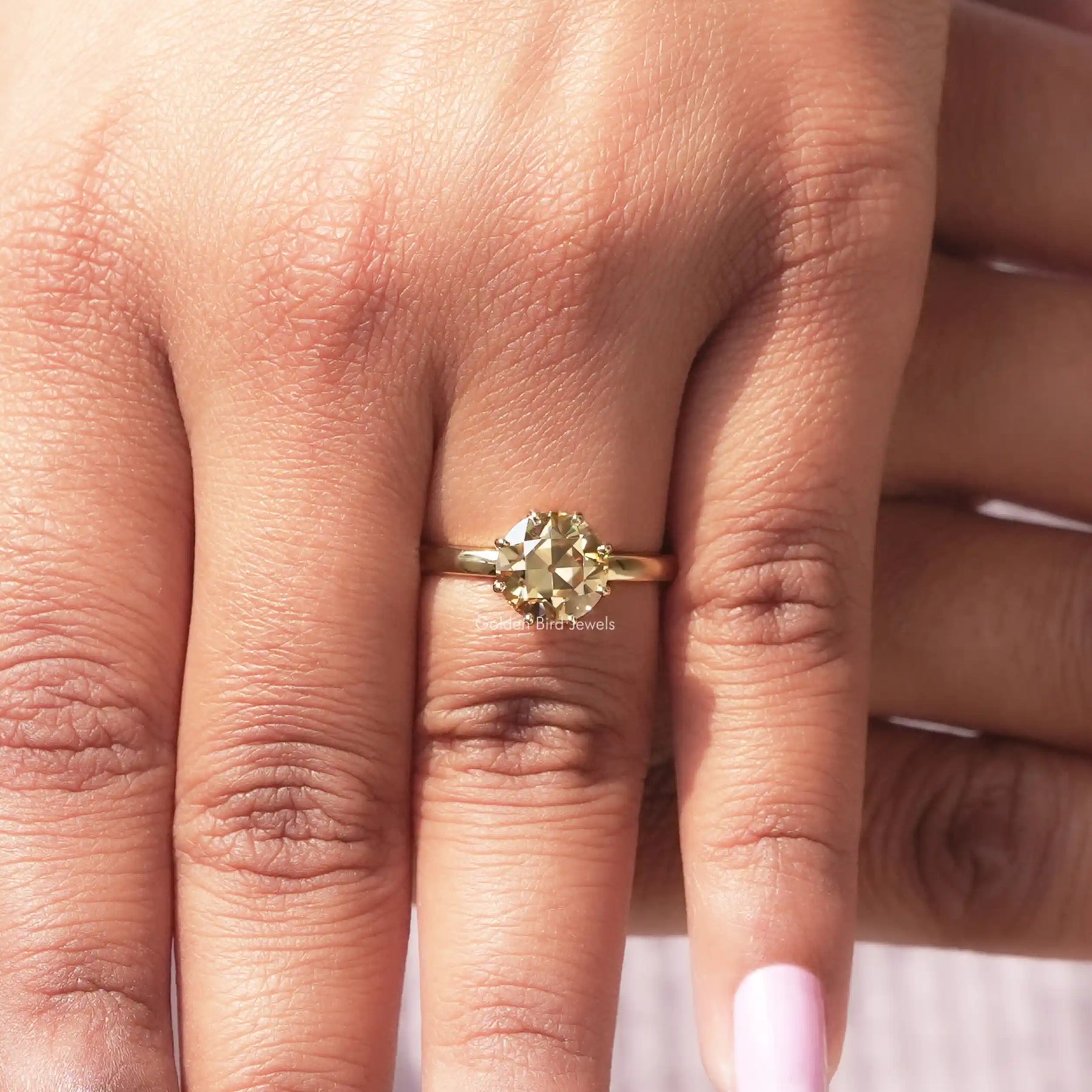 Detailed View Of Round Cut Solitaire Moissanite Ring In Yellow Gold