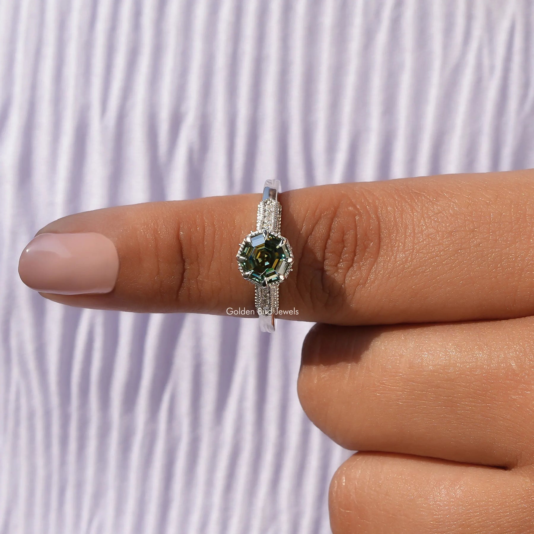 In finger front View of Octagon Cut Moissanite Ring In White Gold