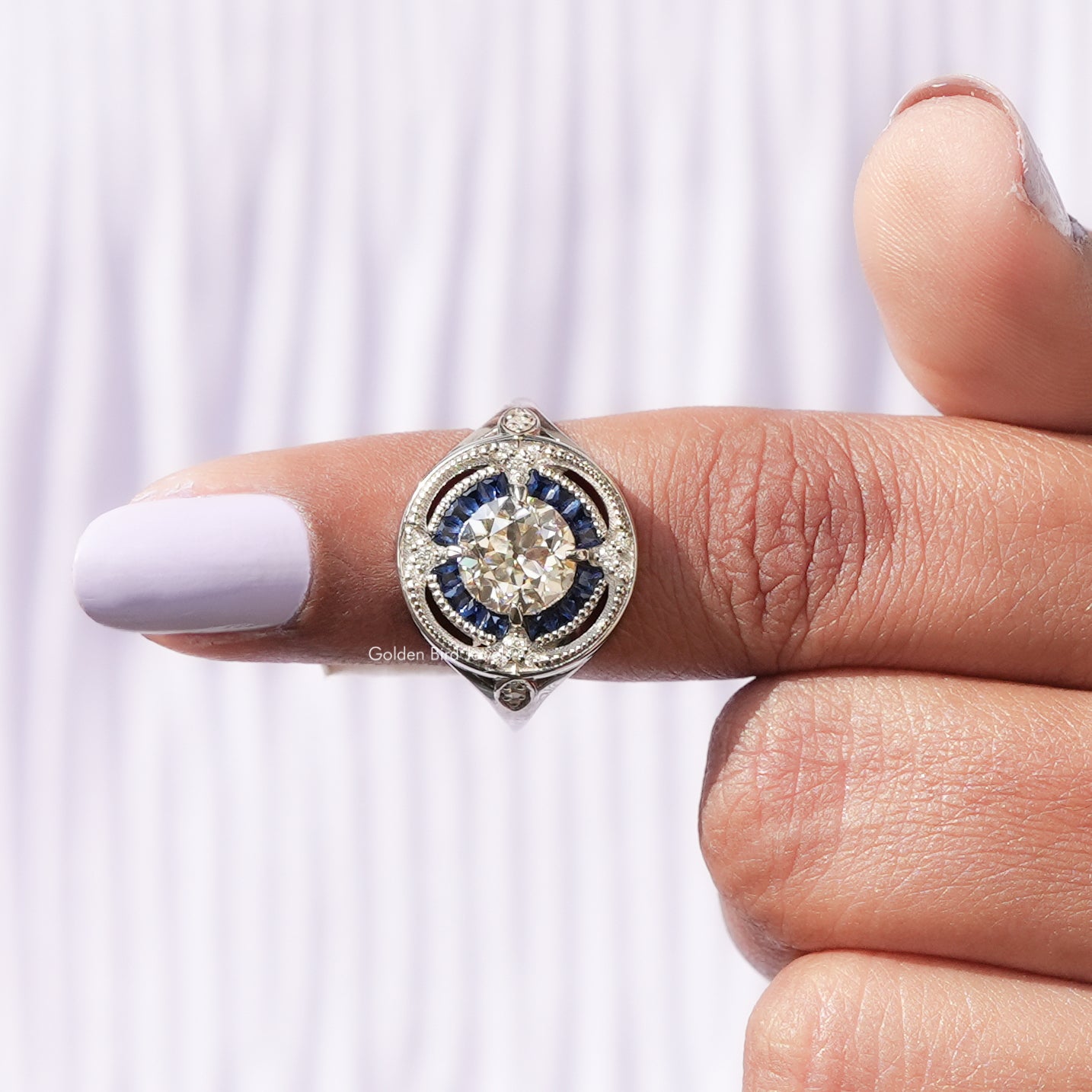In finger front View of Old European Round Cut Moissanite Ring