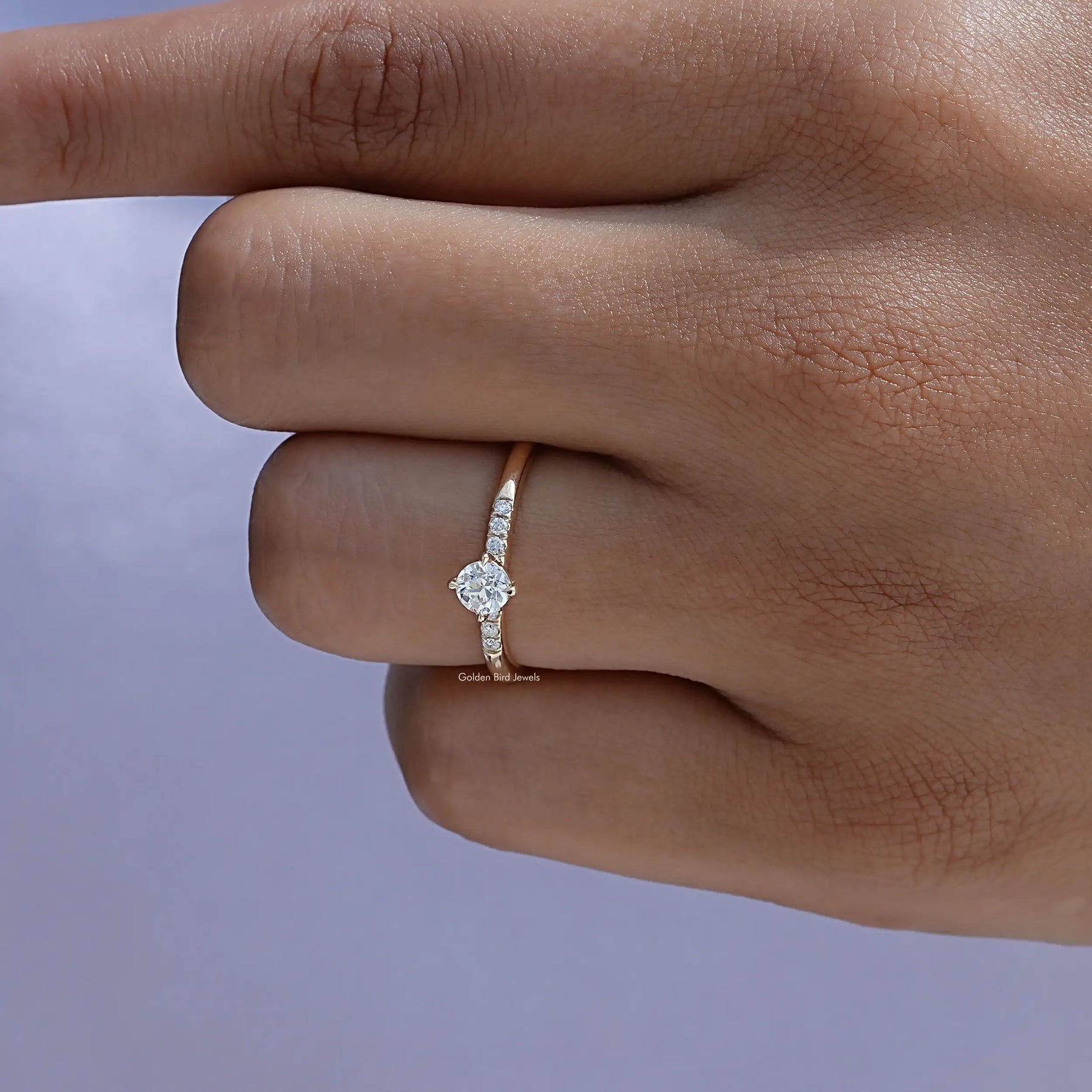 Close-Up View of White Gold Old European Accent Ring in finger