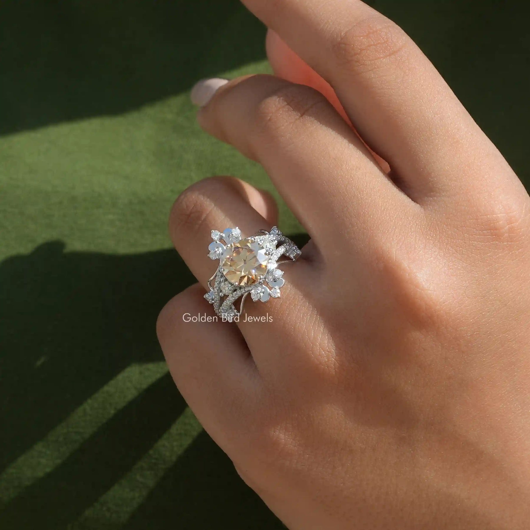 Old European Round Cut Moissanite Halo Ring In Finger