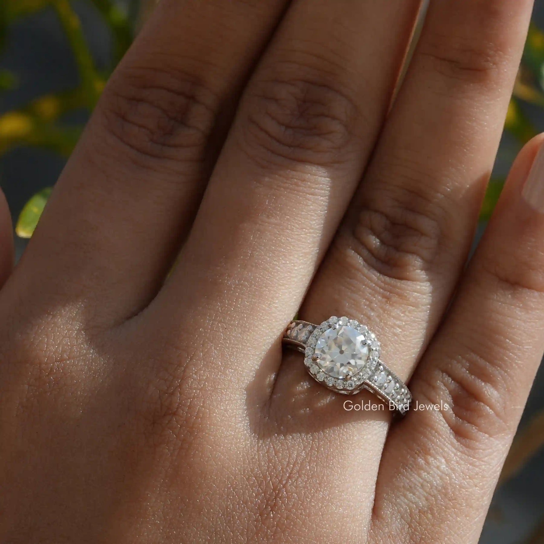View of Moissanite Old European Round Cut Halo Ring In Finger