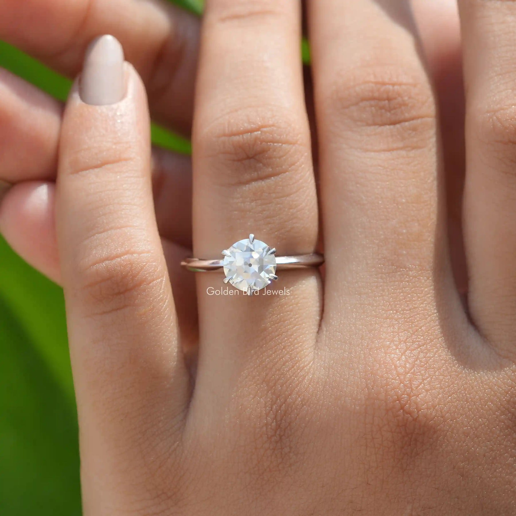 View of Moissanite OEC Round Cut Solitaire Ring In White Gold