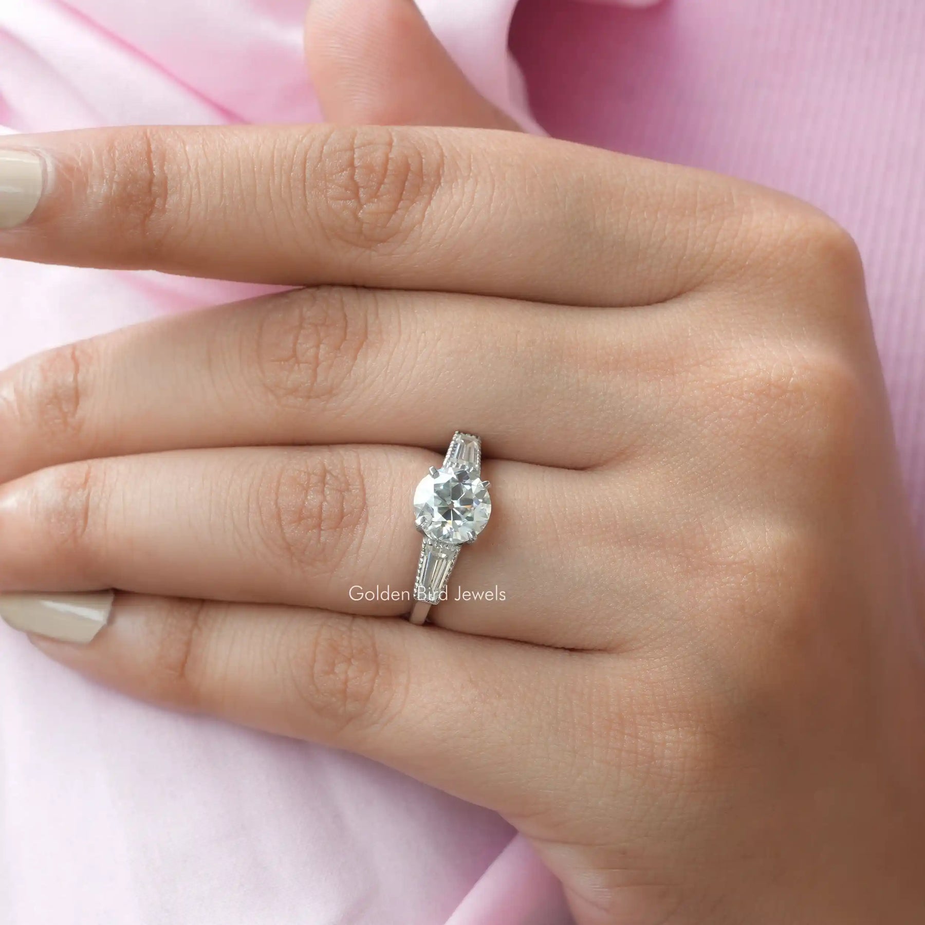 View of Old European Round Cut 3 Stone Engagement Ring In Finger