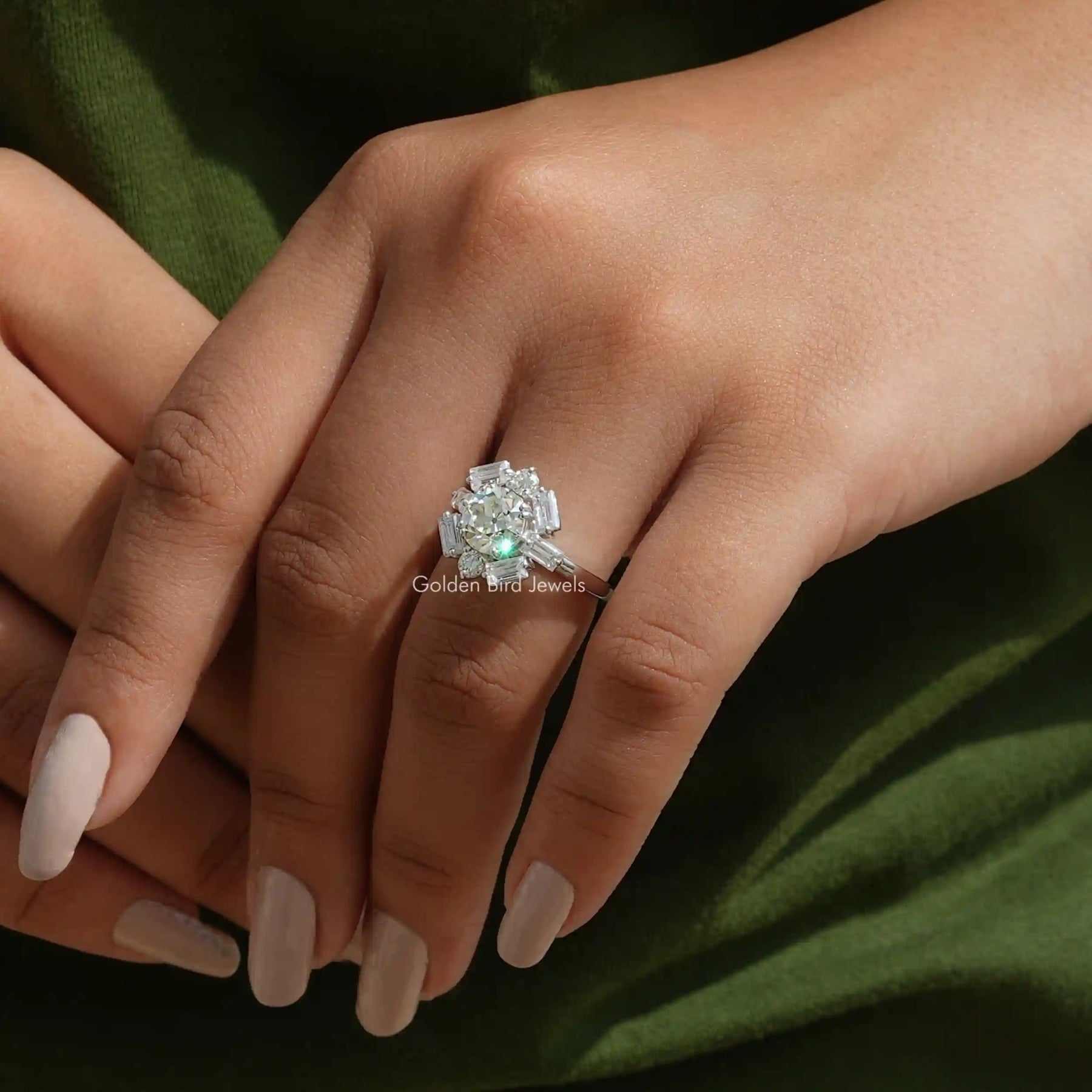 View of Old European Round Cut Ring With Side Stones Baguette Cut In Finger