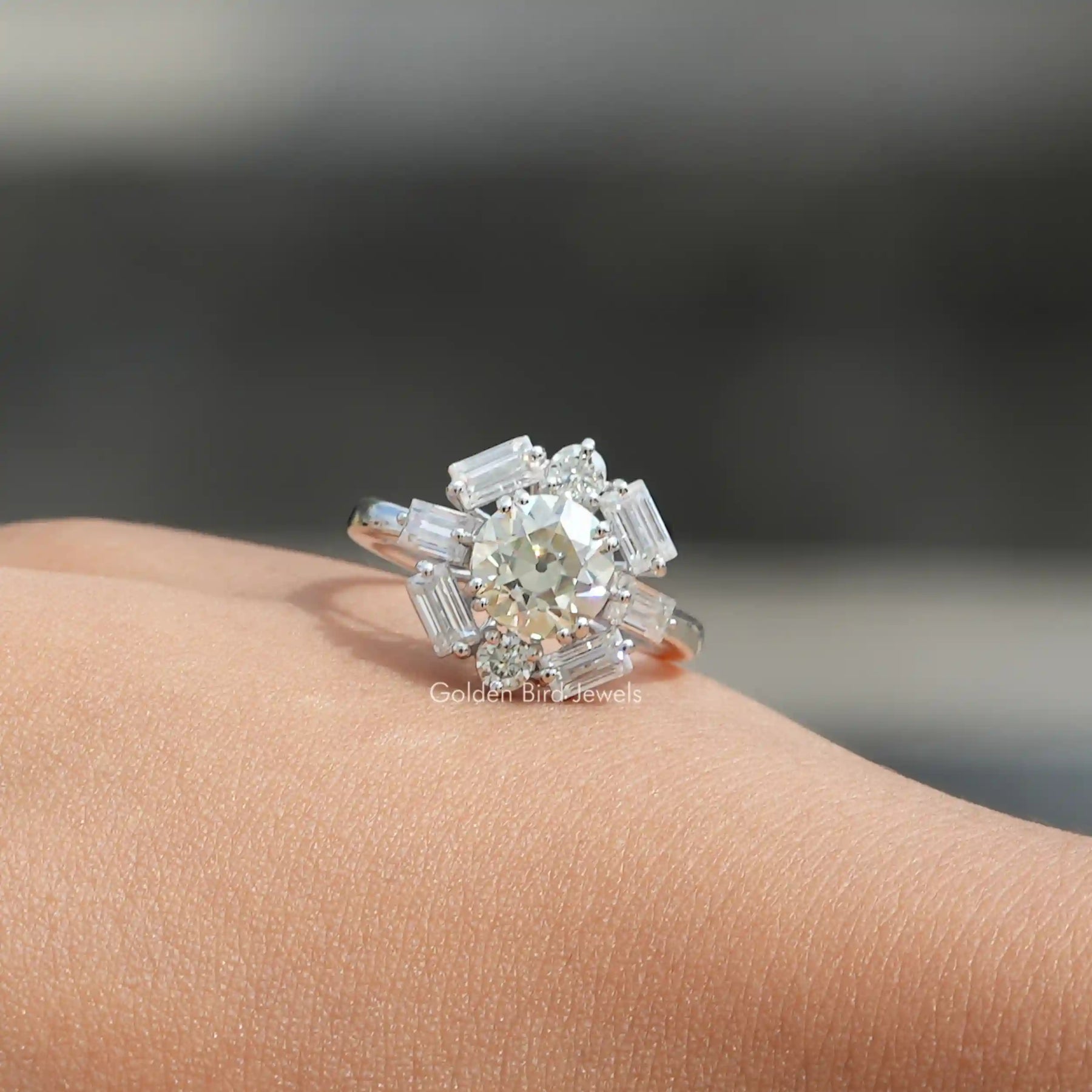View of Round And Baguette Cut Moissanite Halo Engagement Ring