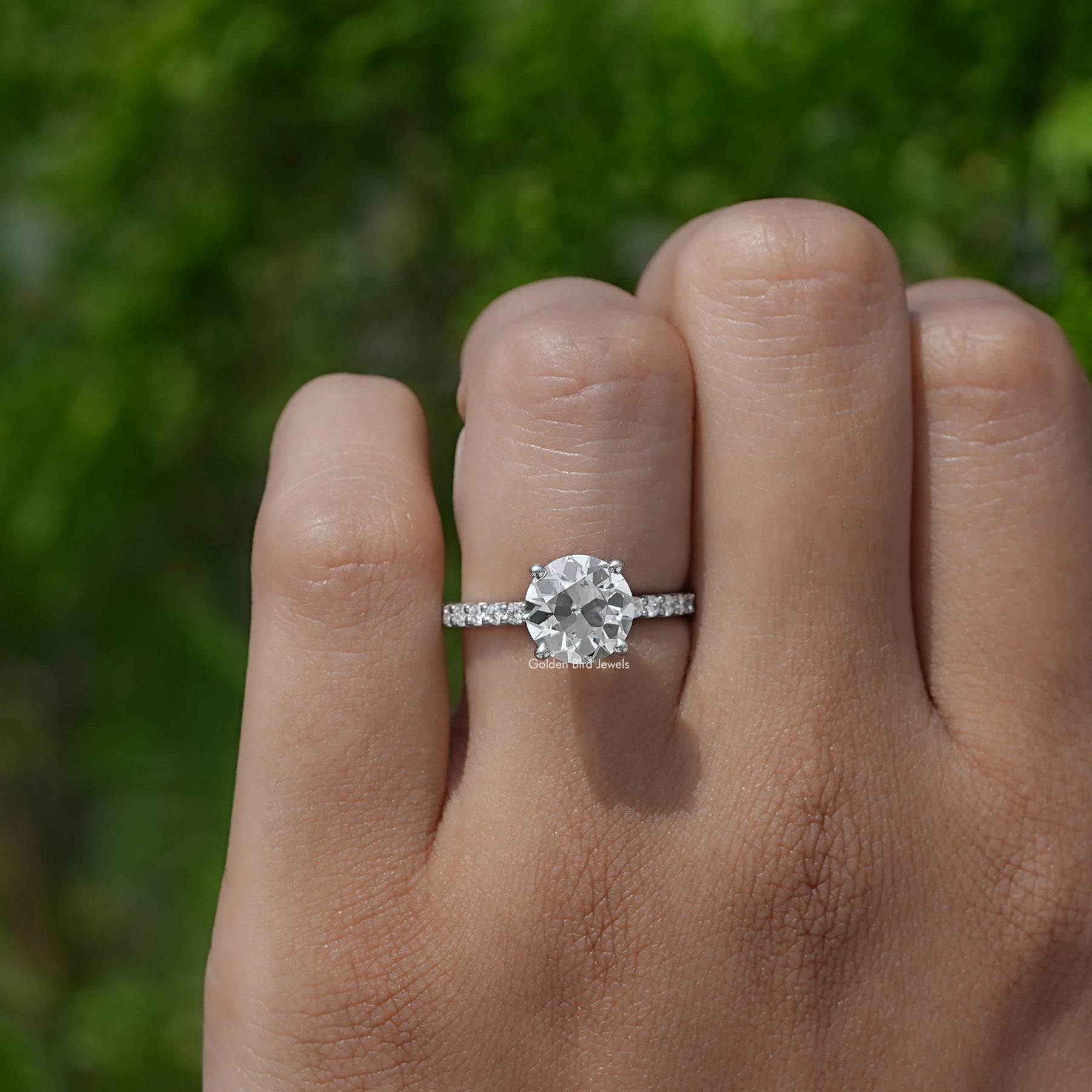 Close-Up View of 14k Old European Round Cut Diamond Accent Ring on finger