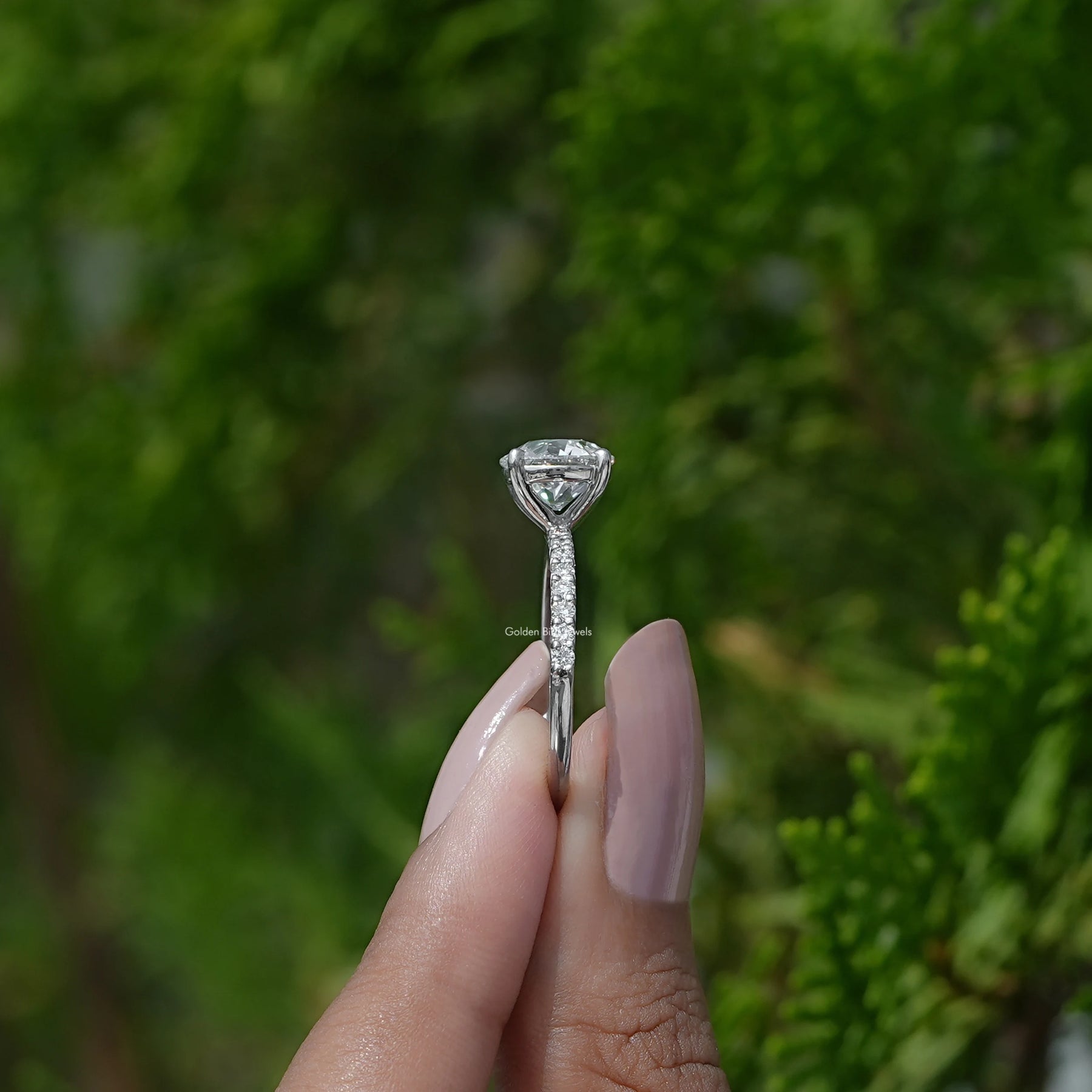 Side View of Old European Round Diamond Ring on two fingers