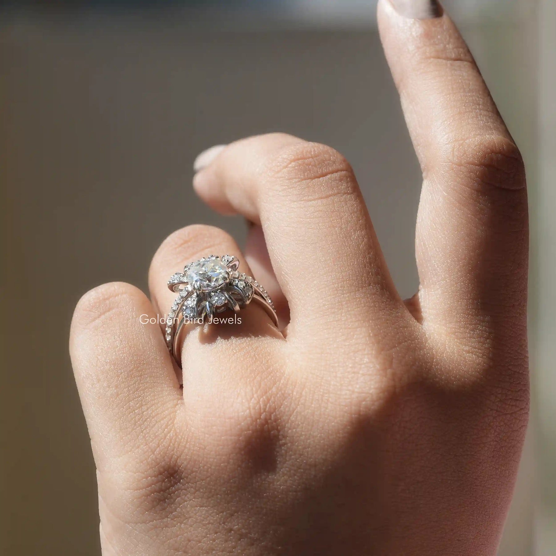 Cushion And Round Cut Moissanite Engagement Ring In Finger