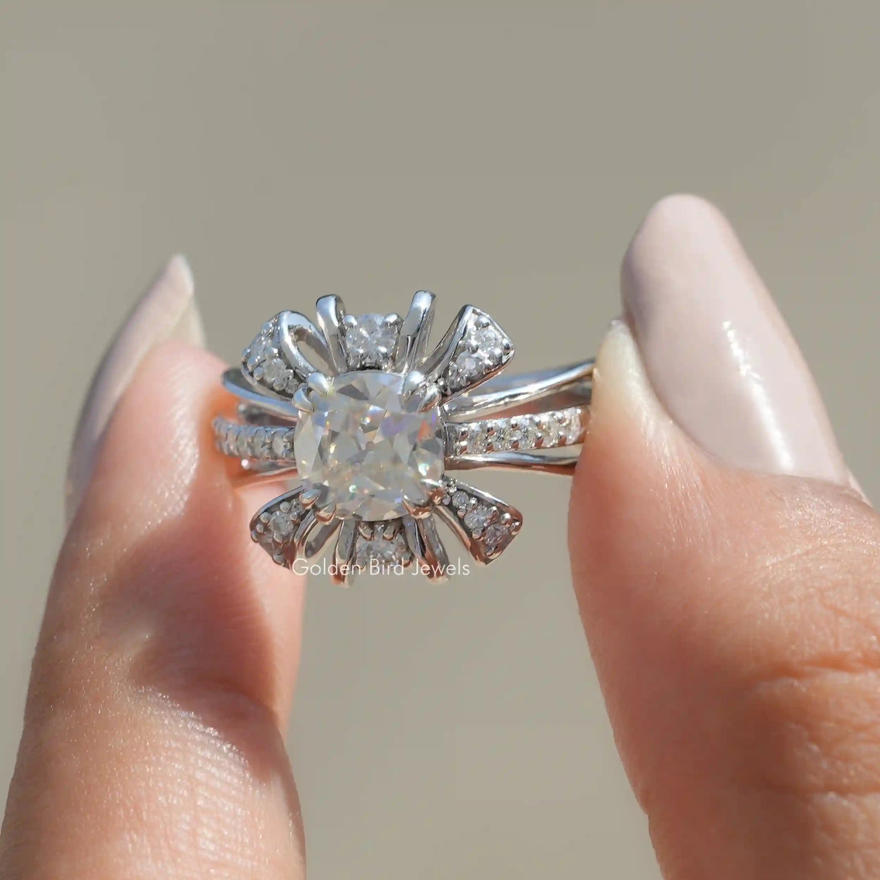 Front View of Old Mine Cushion Cut Moissanite Ring In two Fingers