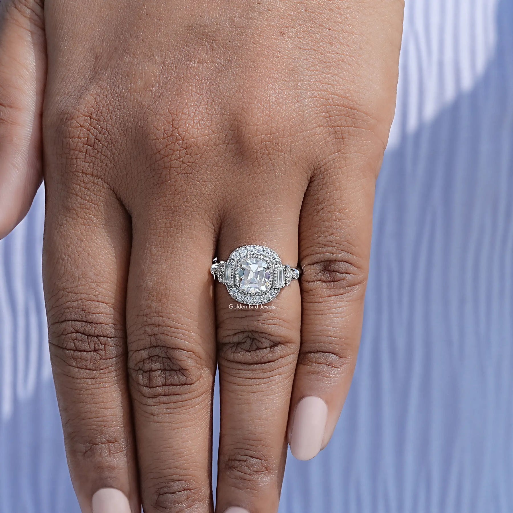 Close view of moissanite ring in secure setting