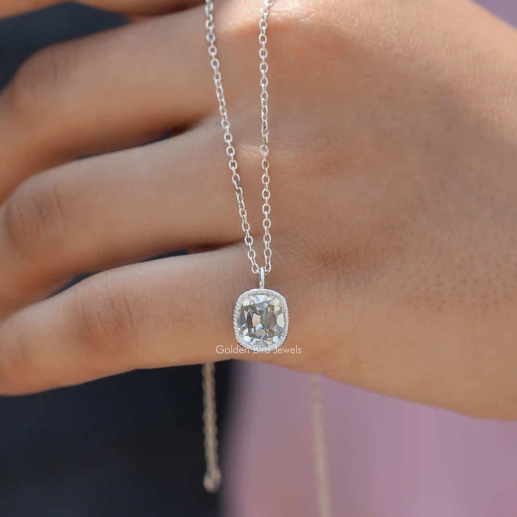 In front view of moissanite cushion cut pendant