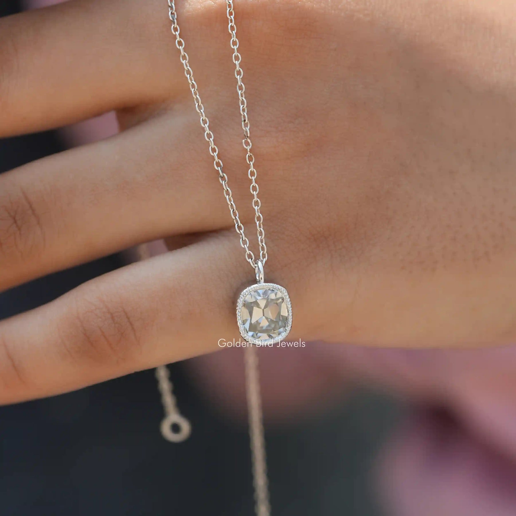 Detailed view of moissanite bridesmaid pendant