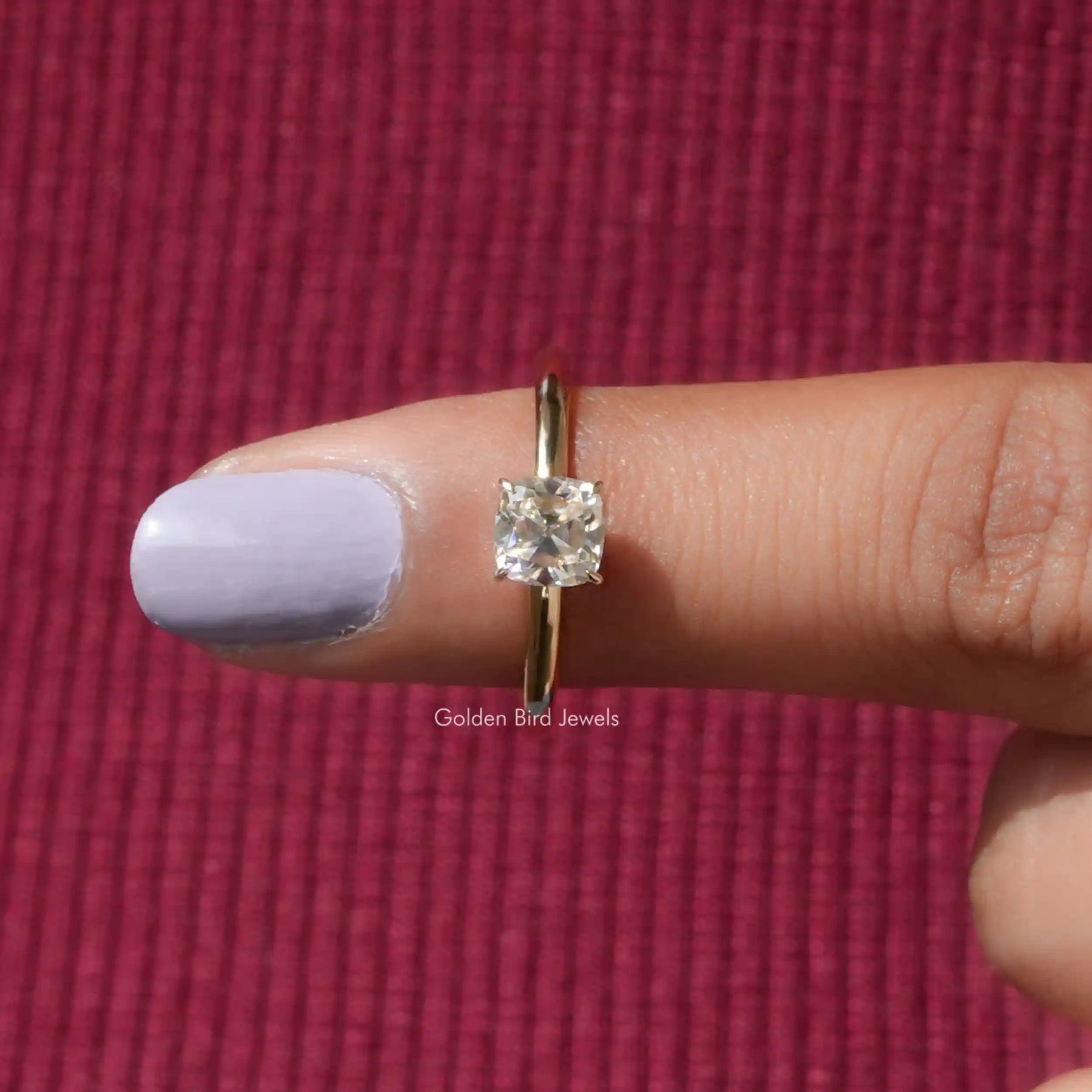 In finger front View of Cushion Cut Moissanite Engagement Ring