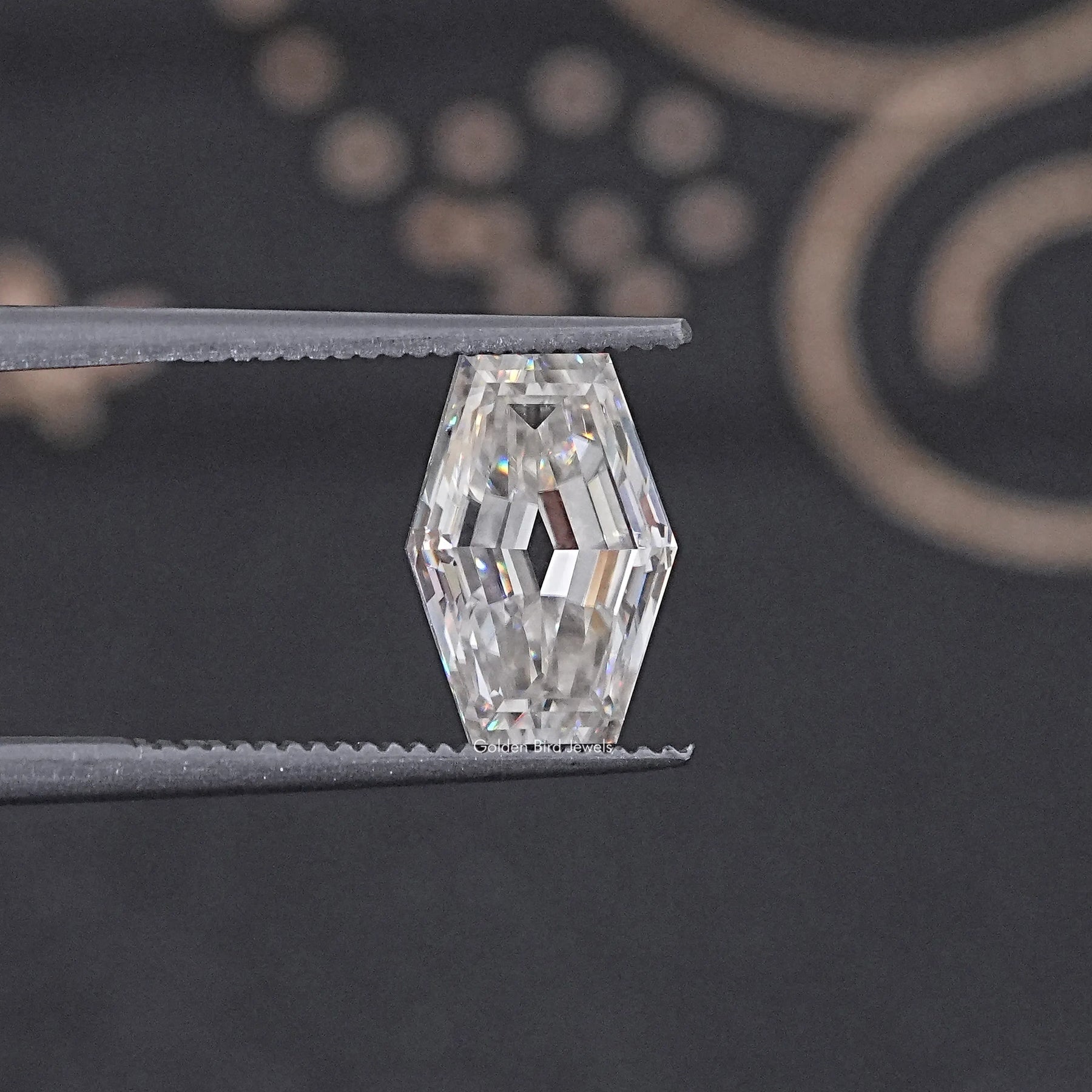 In Tweezer View Of Old Mine Lozenge Cut Loose Moissanite Stone