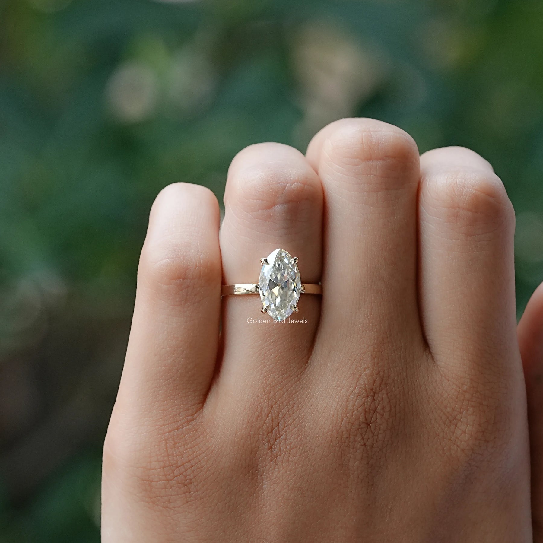 View of Old Mine Marquise Moissanite Solitaire Ring In Yellow Gold