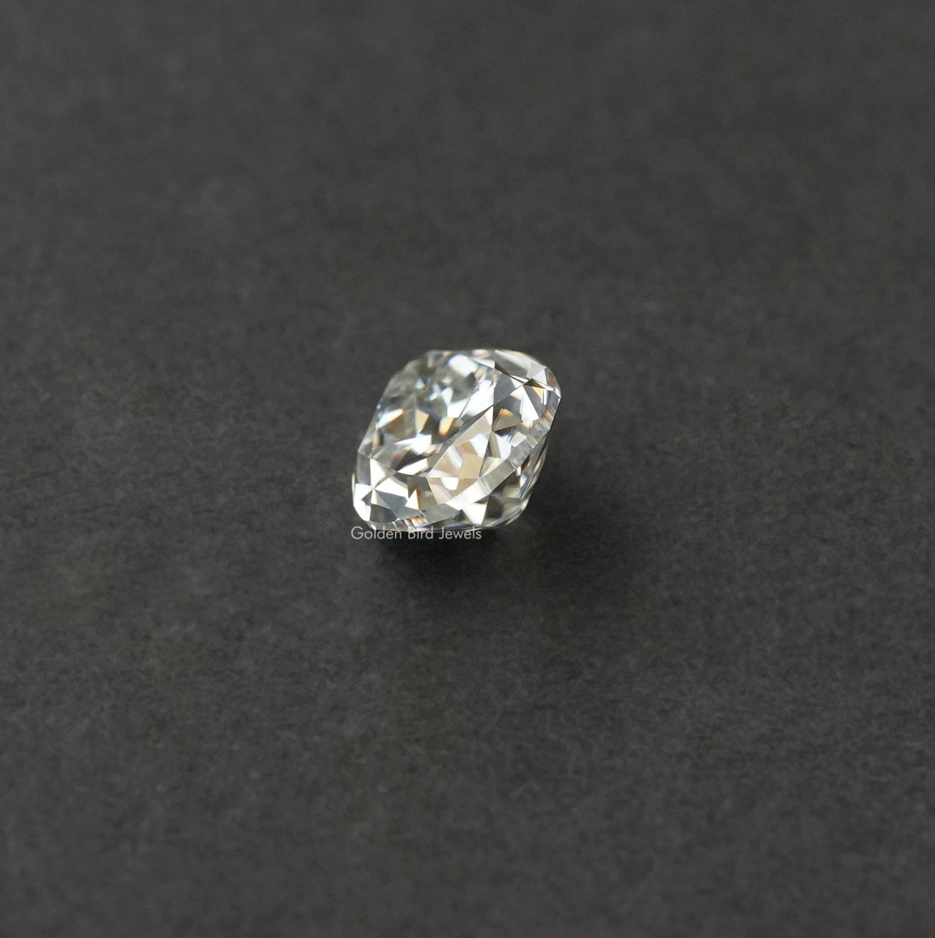 Cross View Of Old mine pear cut loose moissanite